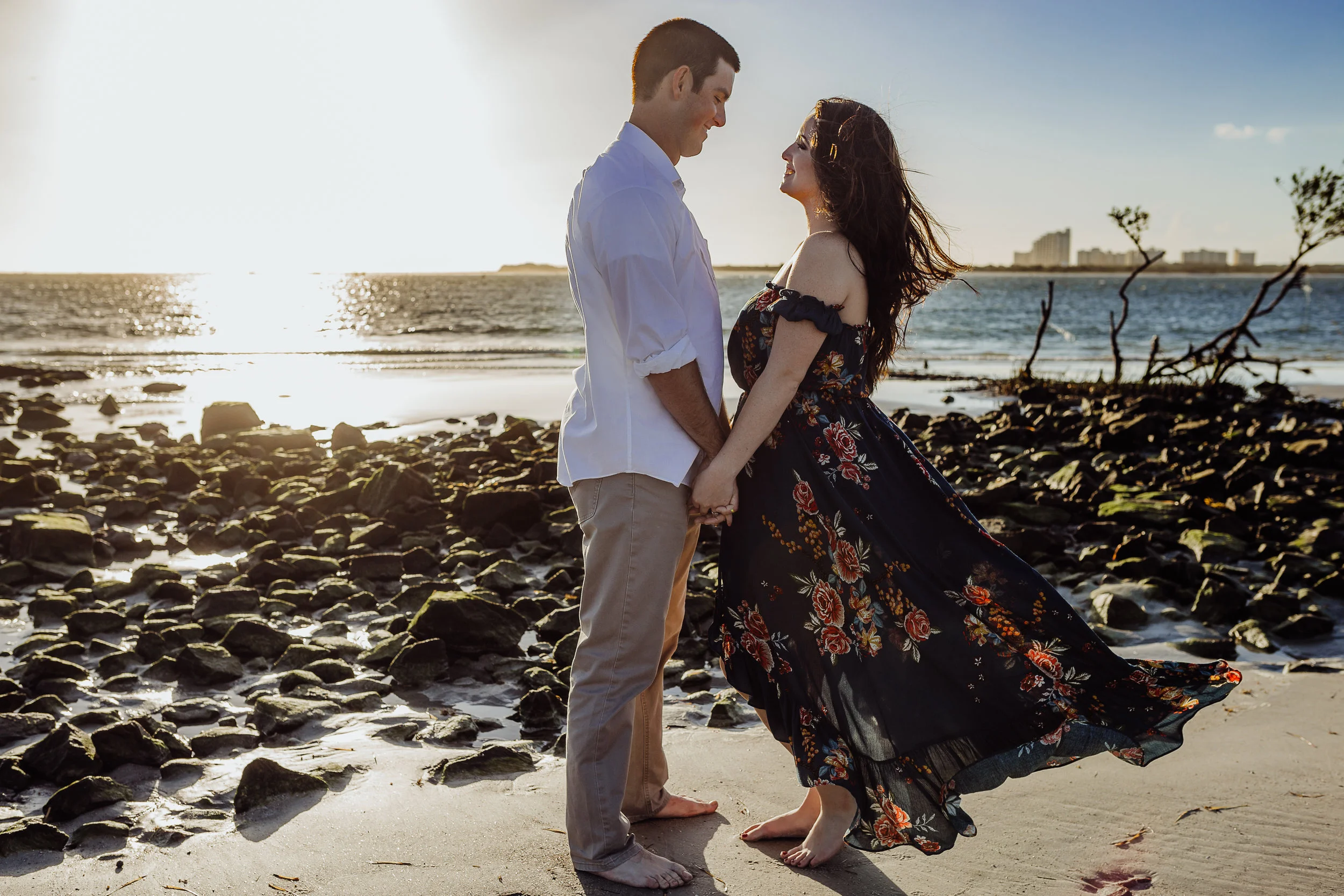 Daytona Beach engagement photographer shot in Ponce Inlet, Fl styled with a floral Sophie and Trey maxi dress