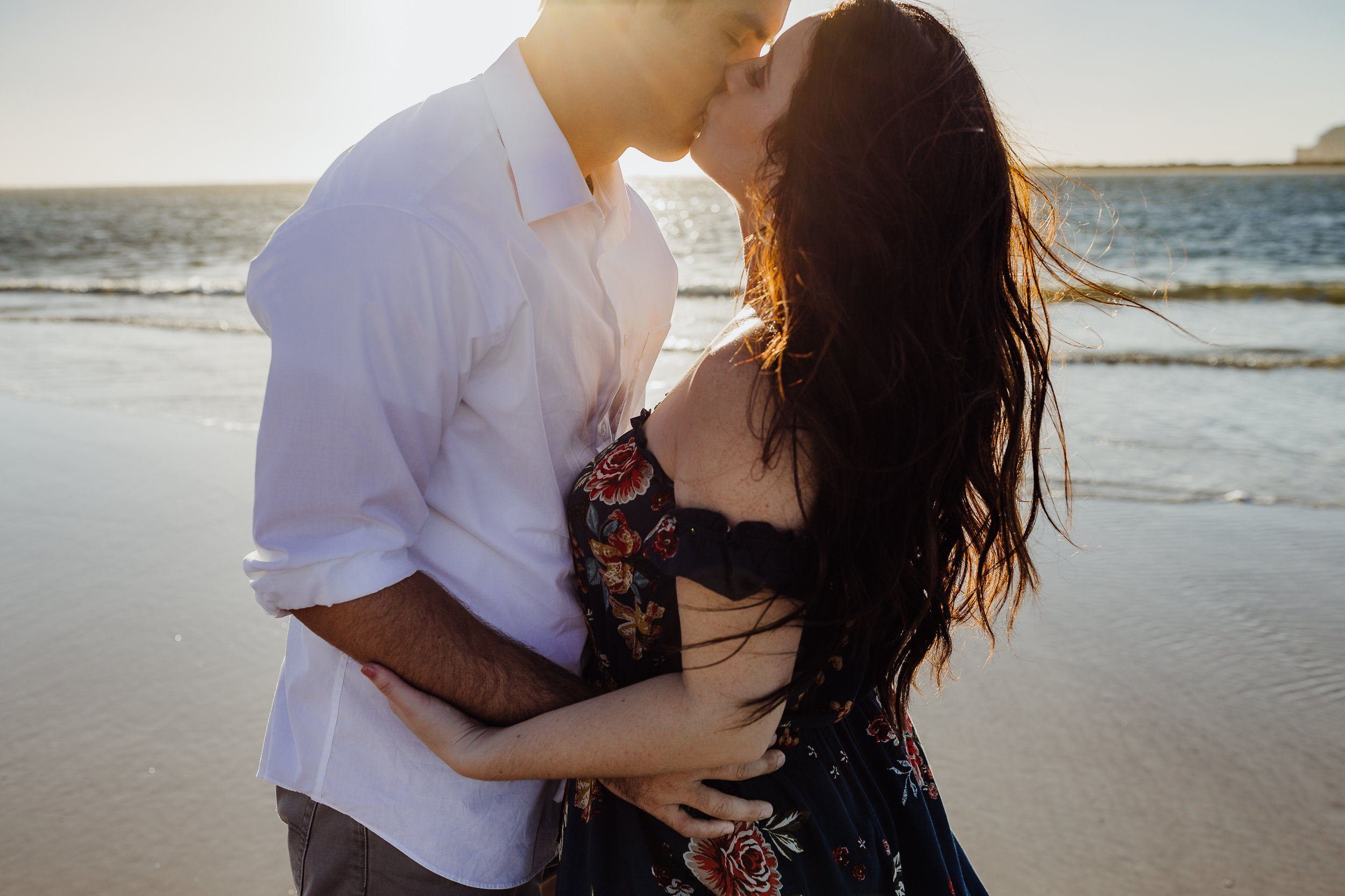 Daytona Beach engagement photographer shot in Ponce Inlet, Fl styled with a floral Sophie and Trey maxi dress