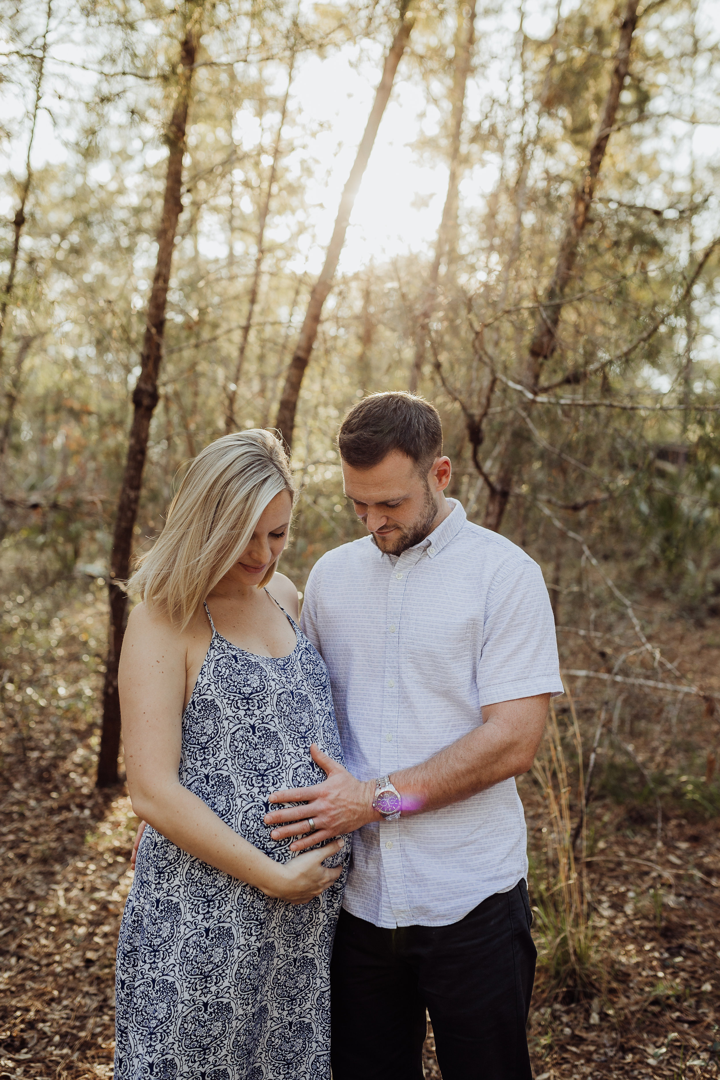 Orlando Maternity Photographer with session location at Kelly Spring park with a boho maxi dress