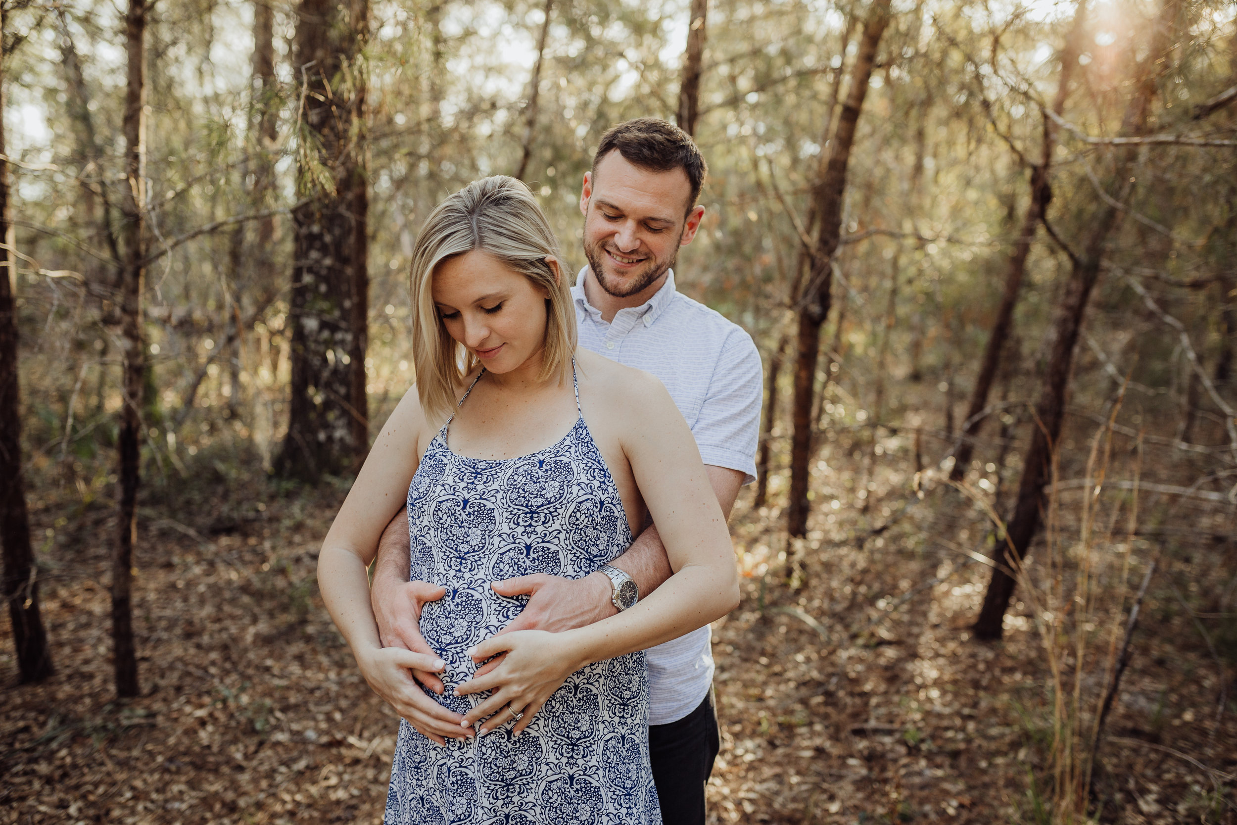 Orlando Maternity Photographer with session location at Kelly Spring park with a boho maxi dress