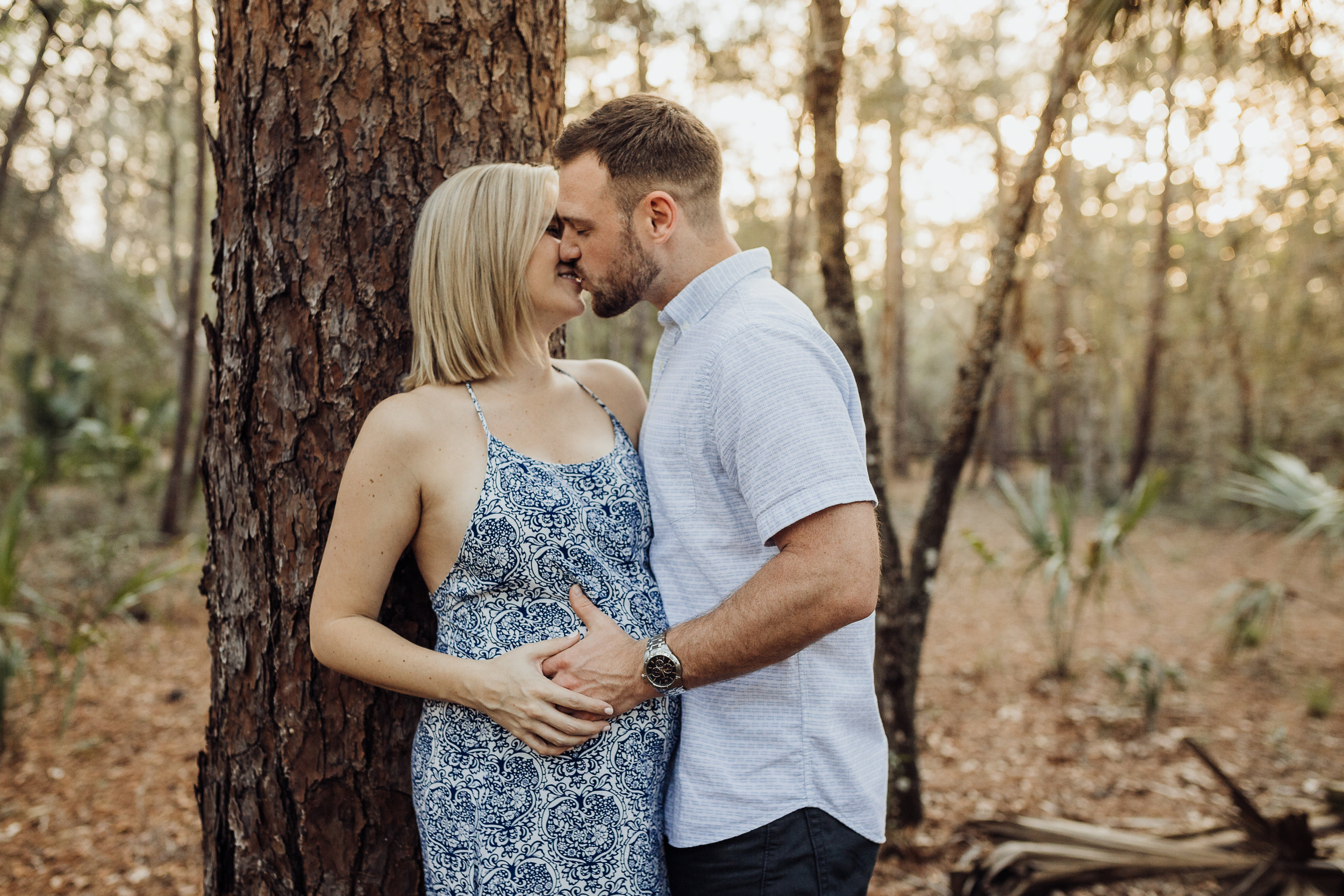 Orlando Maternity Photographer with session location at Kelly Spring park with a boho maxi dress