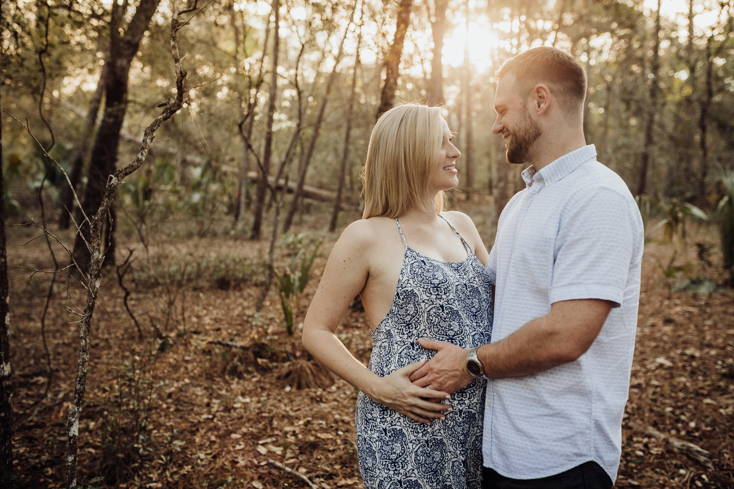 Orlando Maternity Photographer with session location at Kelly Spring park with a boho maxi dress