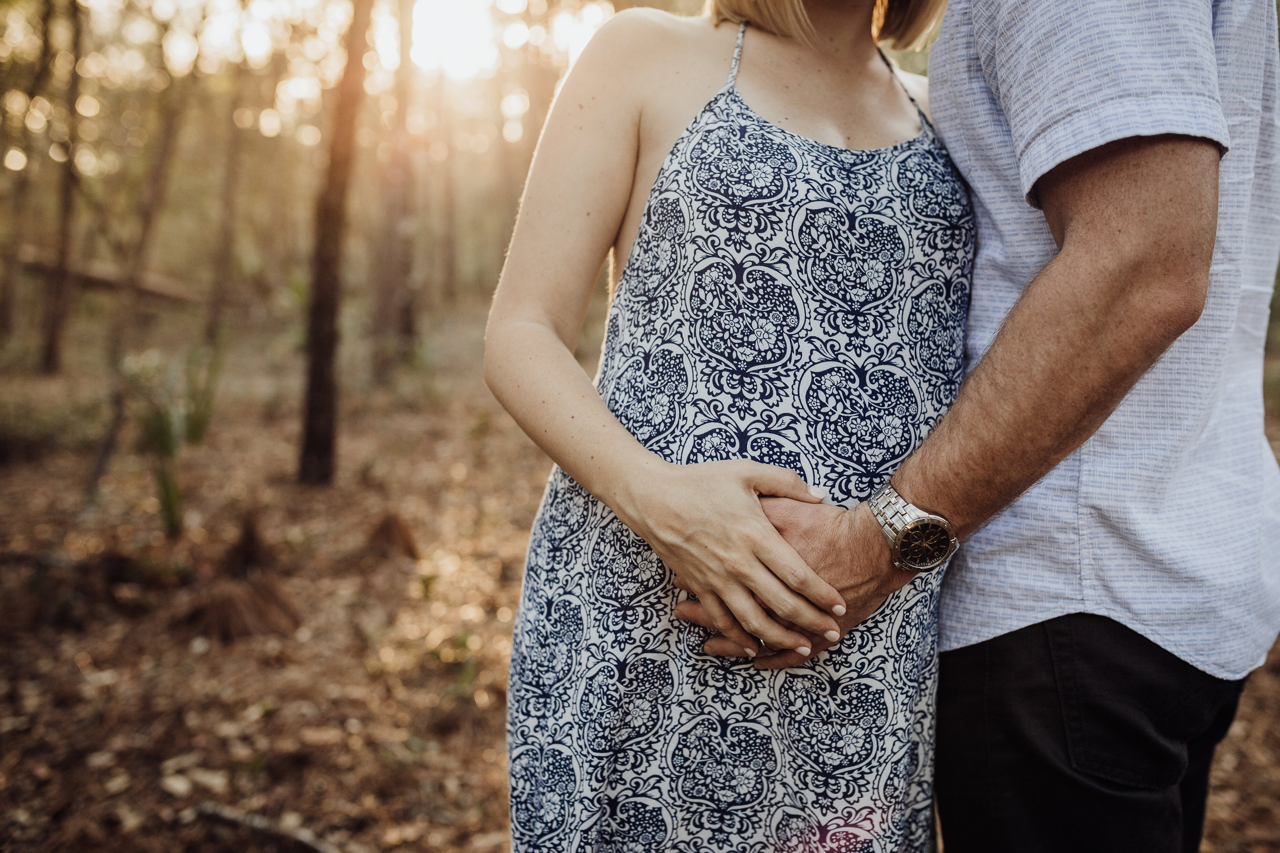 Orlando Maternity Photographer with session location at Kelly Spring park with a boho maxi dress