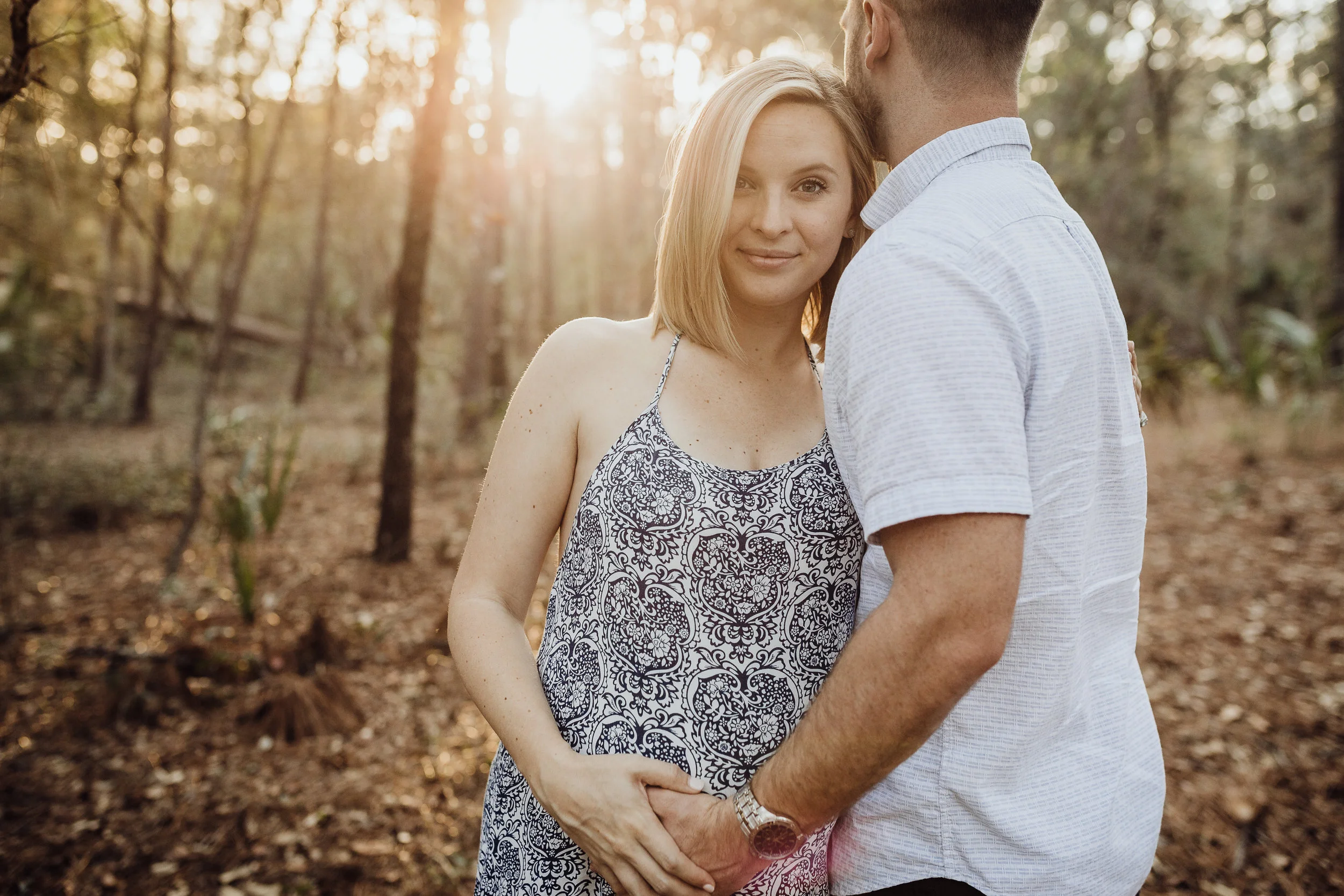 Orlando Maternity Photographer with session location at Kelly Spring park with a boho maxi dress