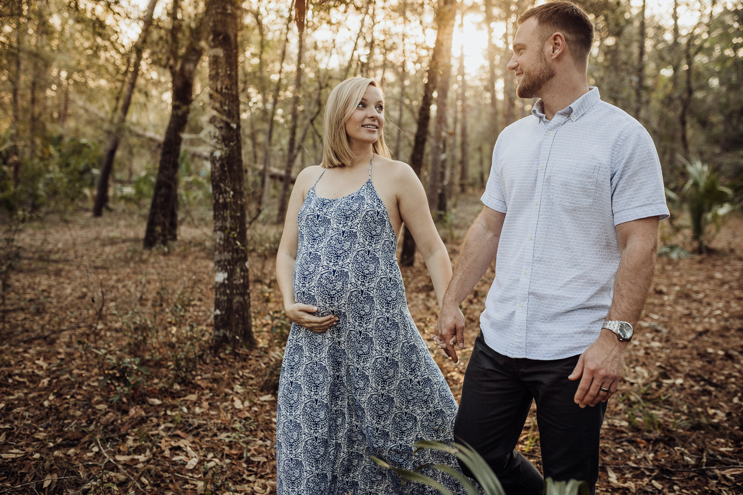 Orlando Maternity Photographer with session location at Kelly Spring park with a boho maxi dress