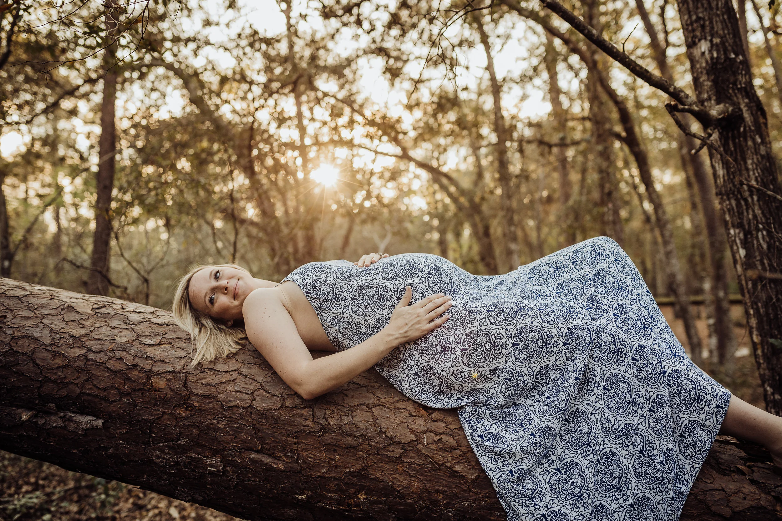 Orlando Maternity Photographer with session location at Kelly Spring park with a boho maxi dress