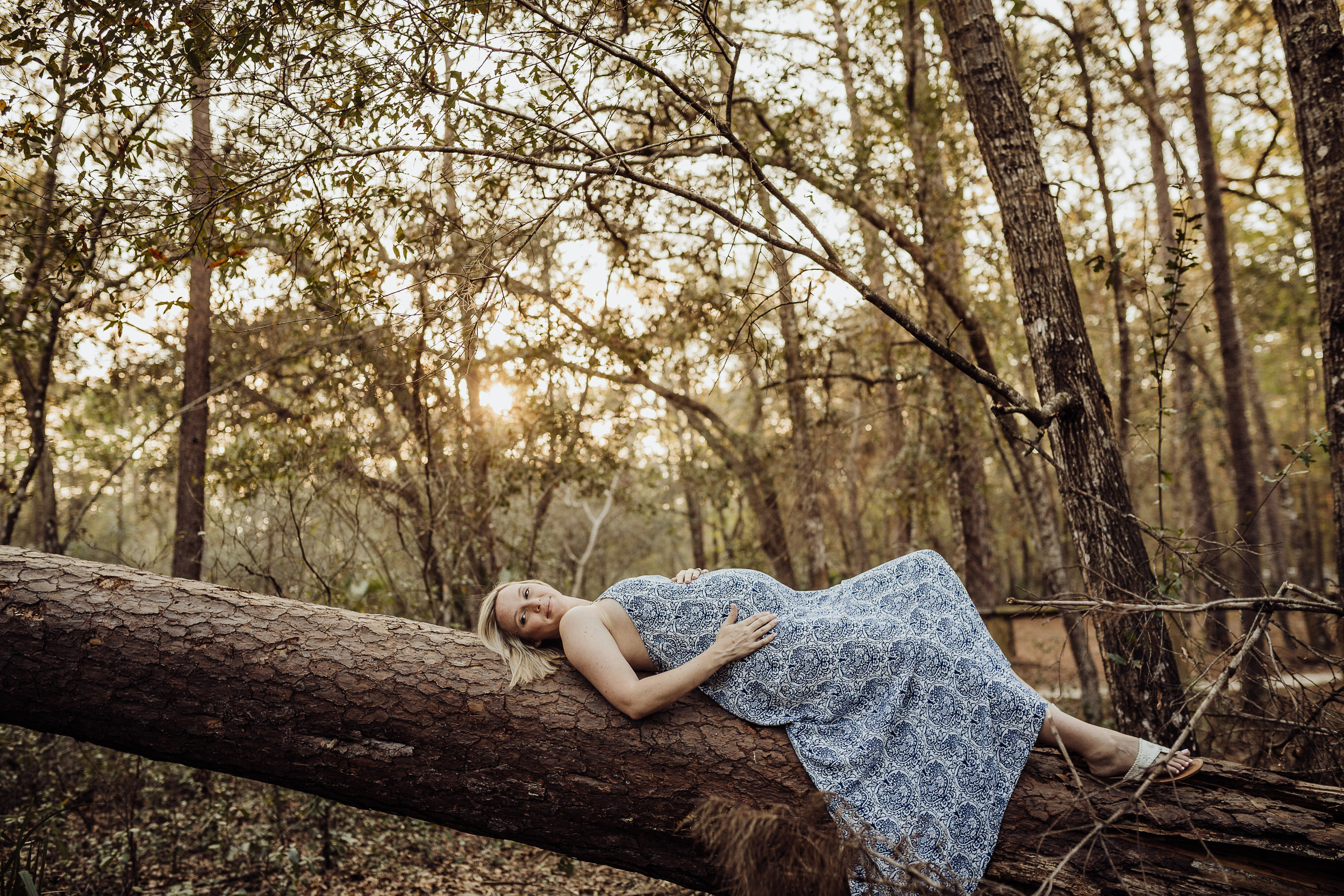 Orlando Maternity Photographer with session location at Kelly Spring park with a boho maxi dress