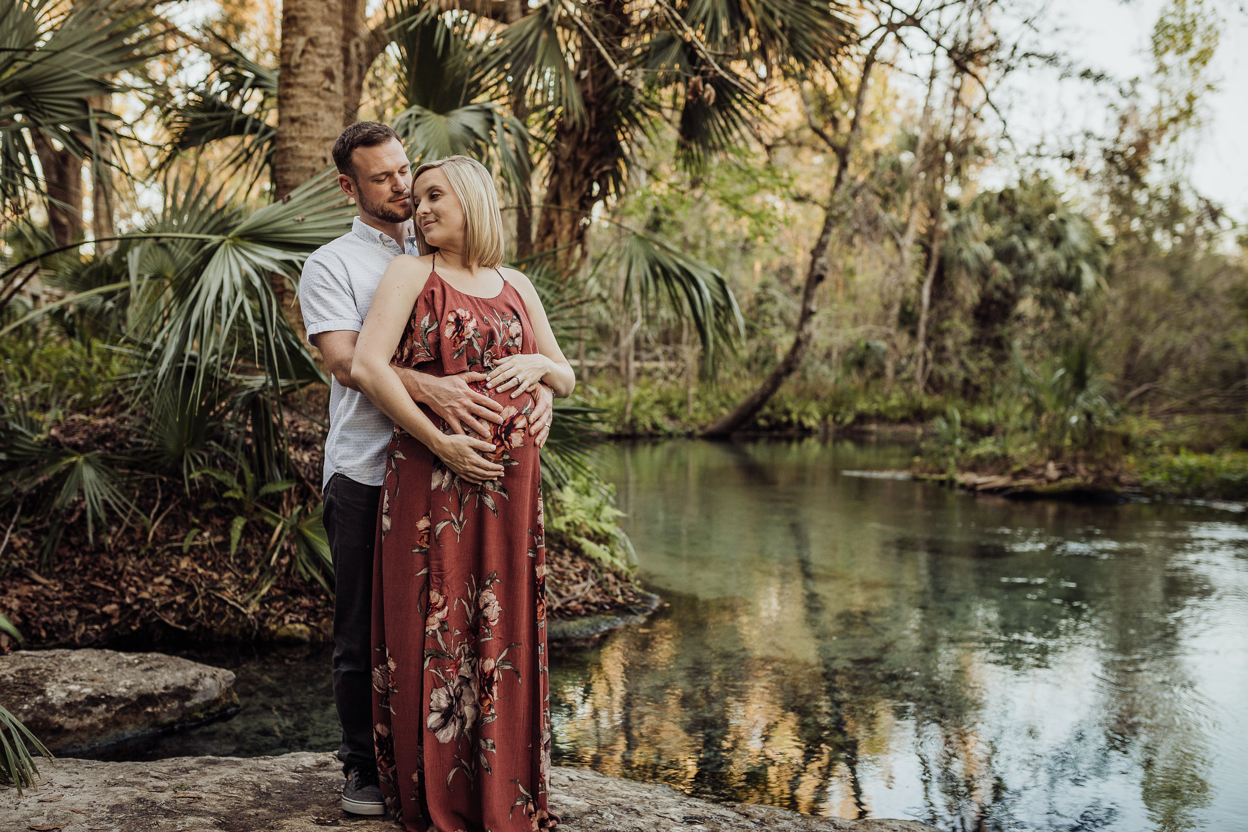 Orlando Maternity Photographer with session location at Kelly Spring park with a boho maxi dress