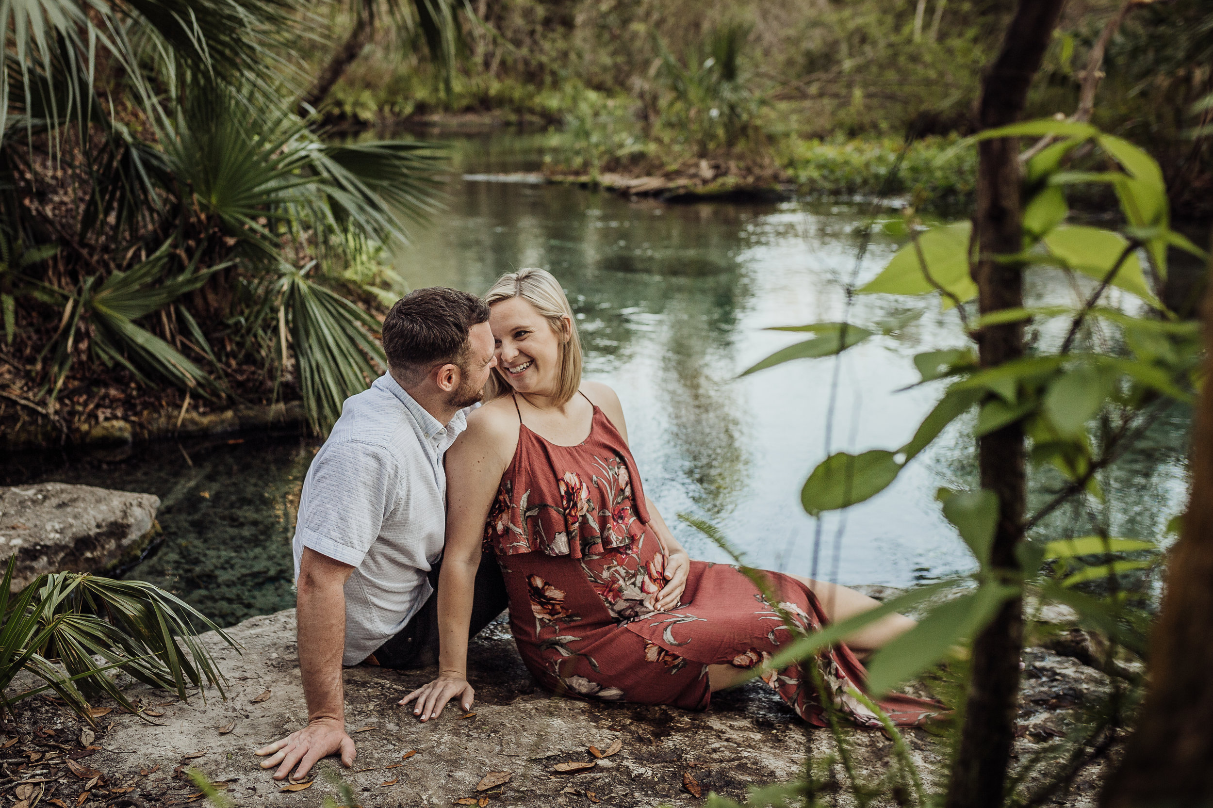 Orlando Maternity Photographer with session location at Kelly Spring park with a boho maxi dress