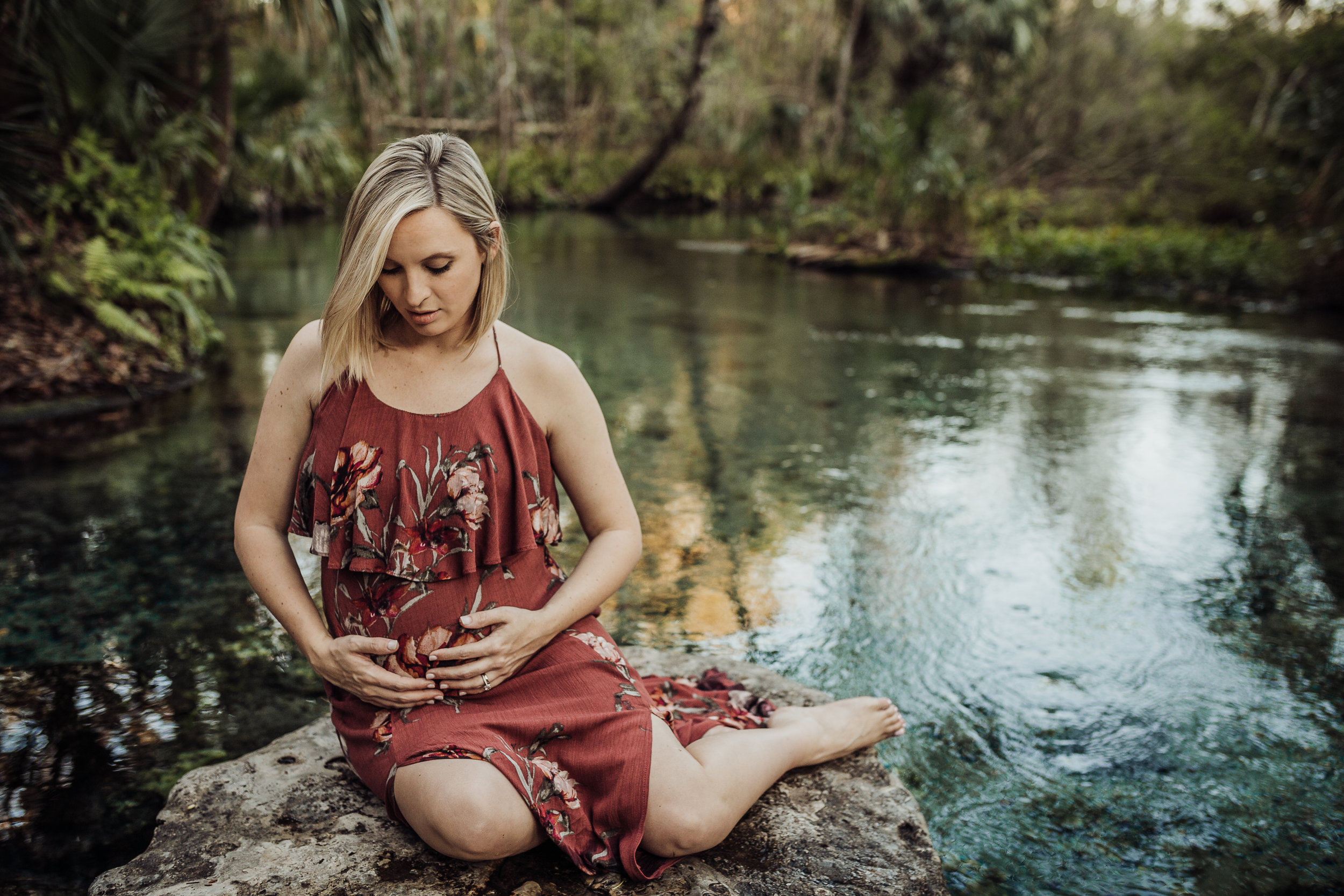 Orlando Maternity Photographer with session location at Kelly Spring park with a boho maxi dress