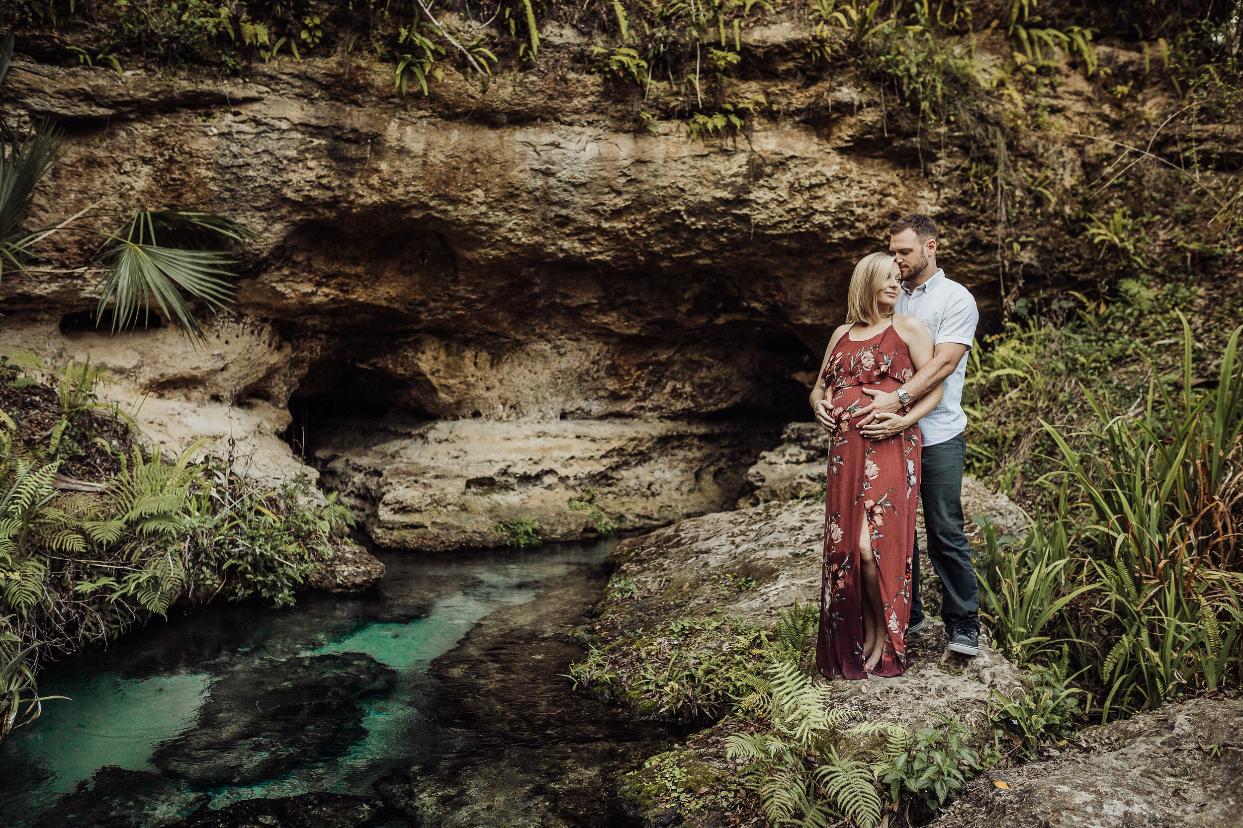 Orlando Maternity Photographer with session location at Kelly Spring park with a boho maxi dress