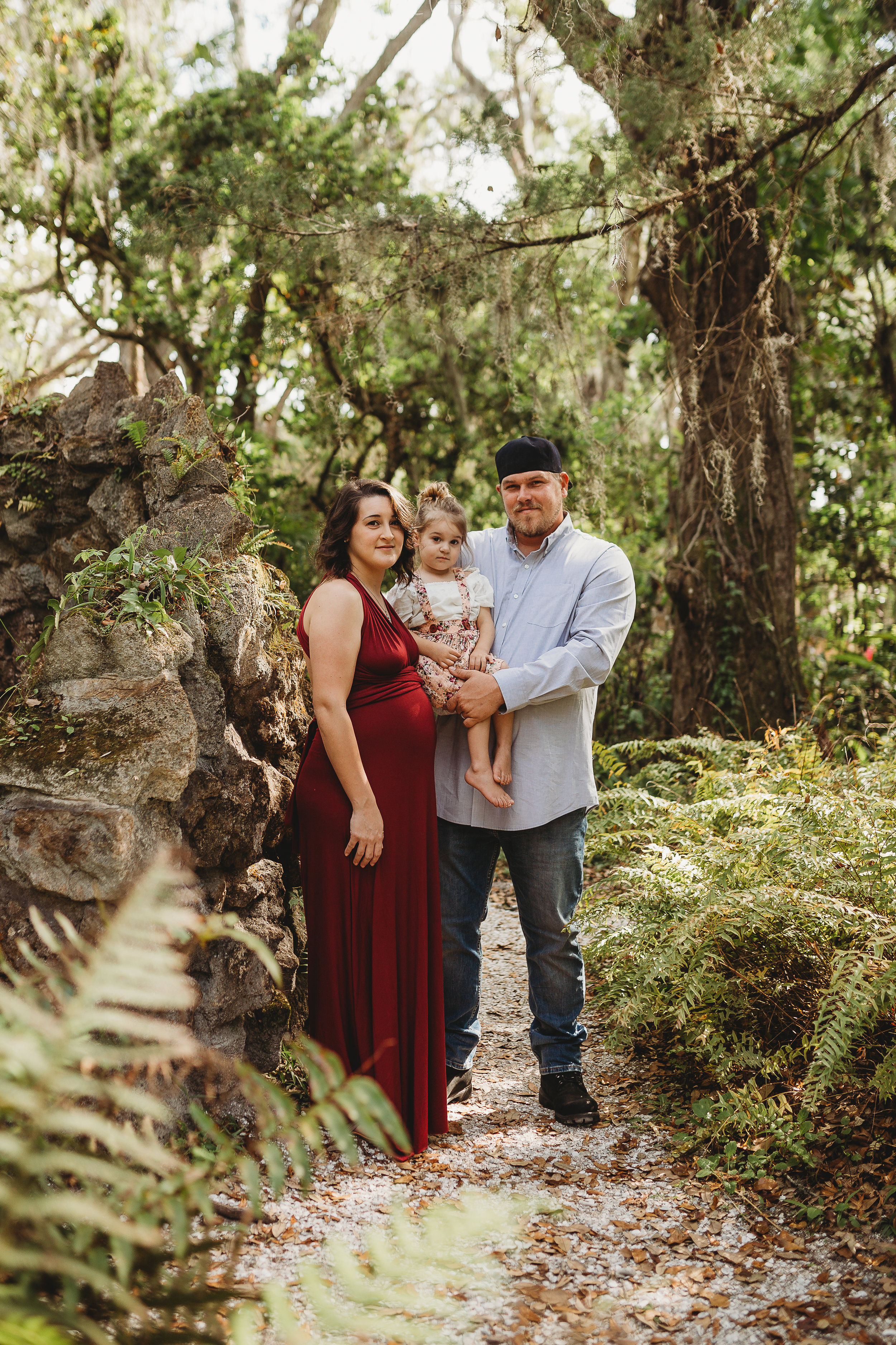 Daytona Beach Maternity photographer capturing emotive images at Sugar Mill Gardens in Port Orange