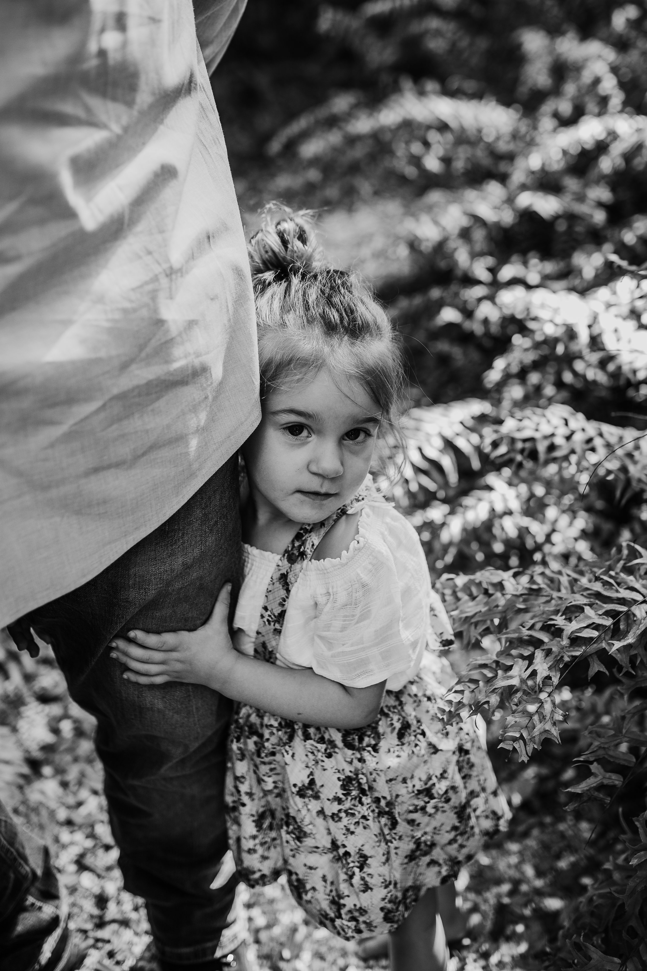 Daytona Beach Maternity photographer capturing emotive images at Sugar Mill Gardens in Port Orange