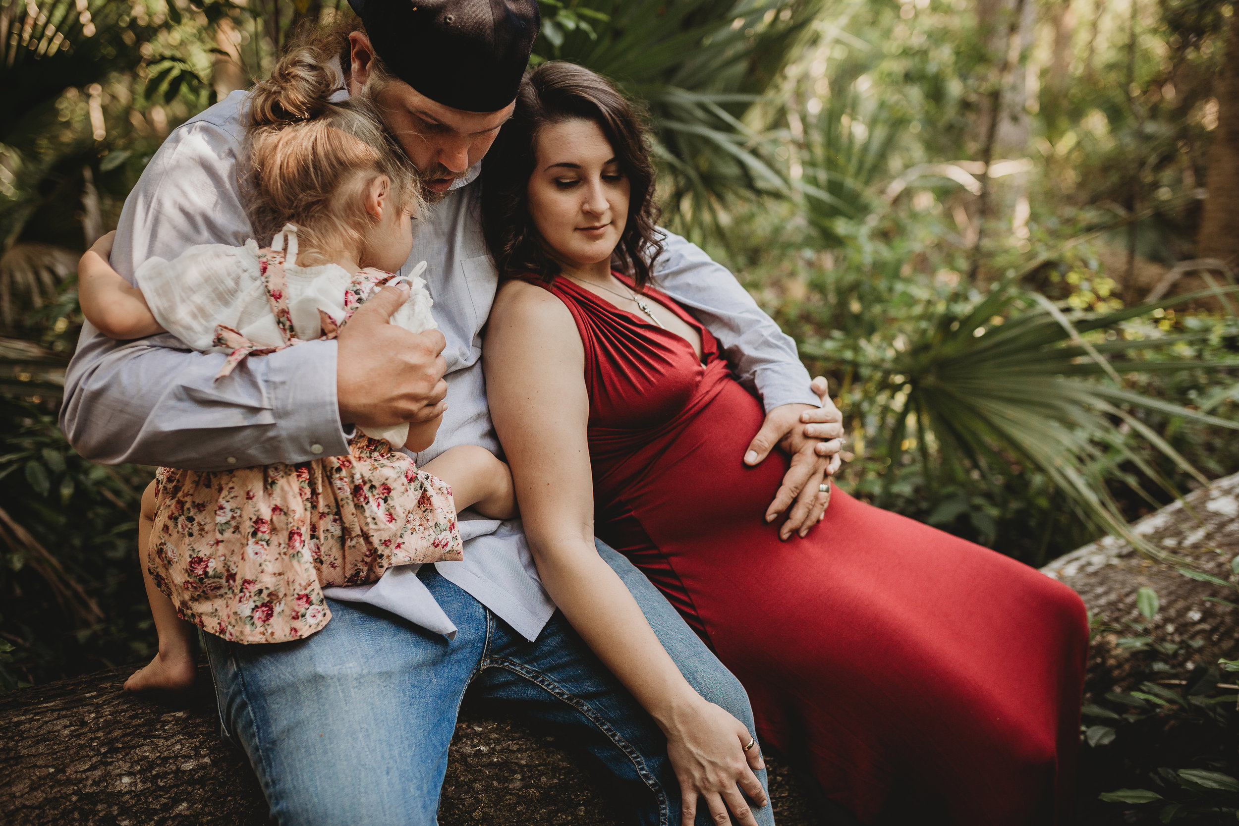 Daytona Beach Maternity photographer capturing emotive images at Sugar Mill Gardens in Port Orange