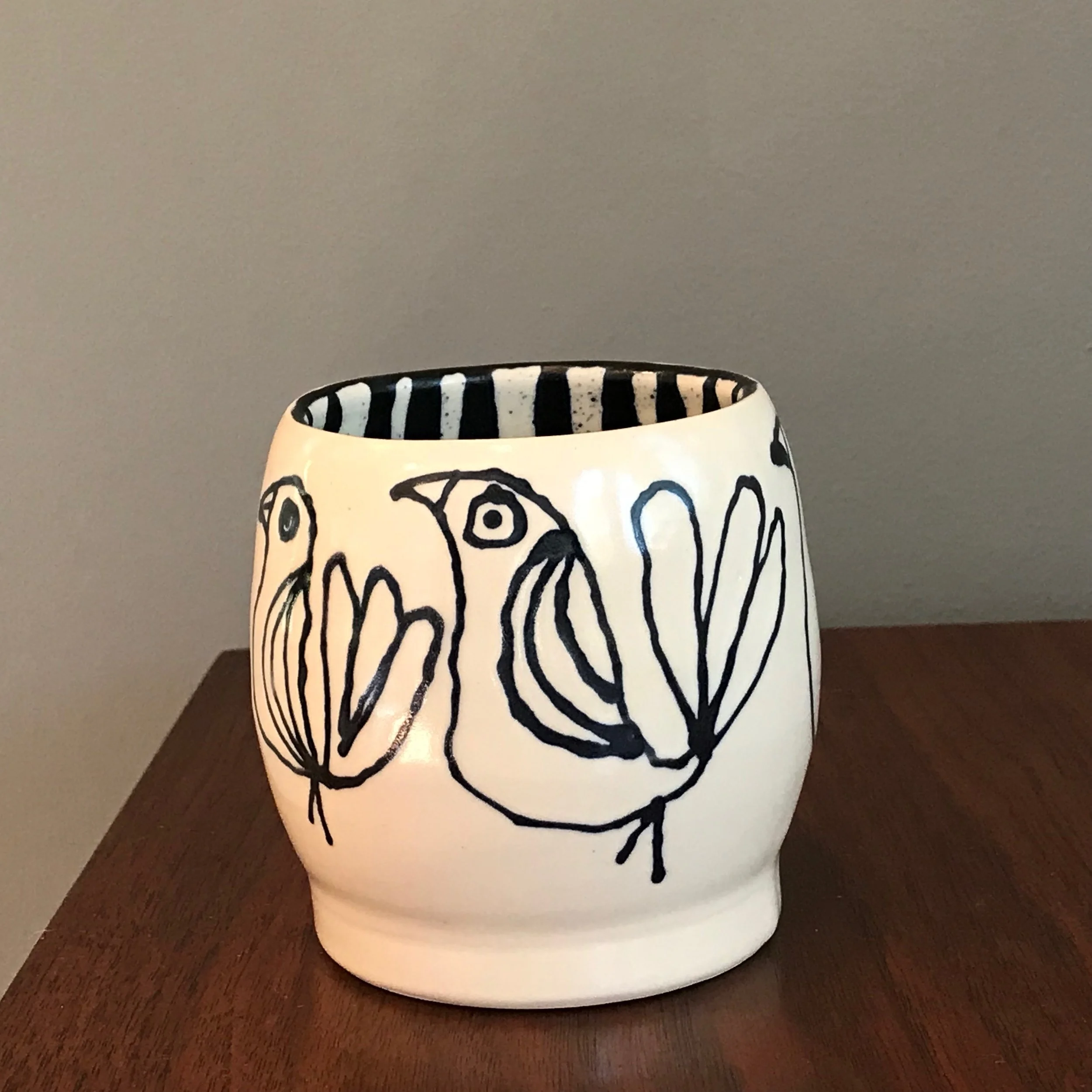 bird tumbler with drips and spatter