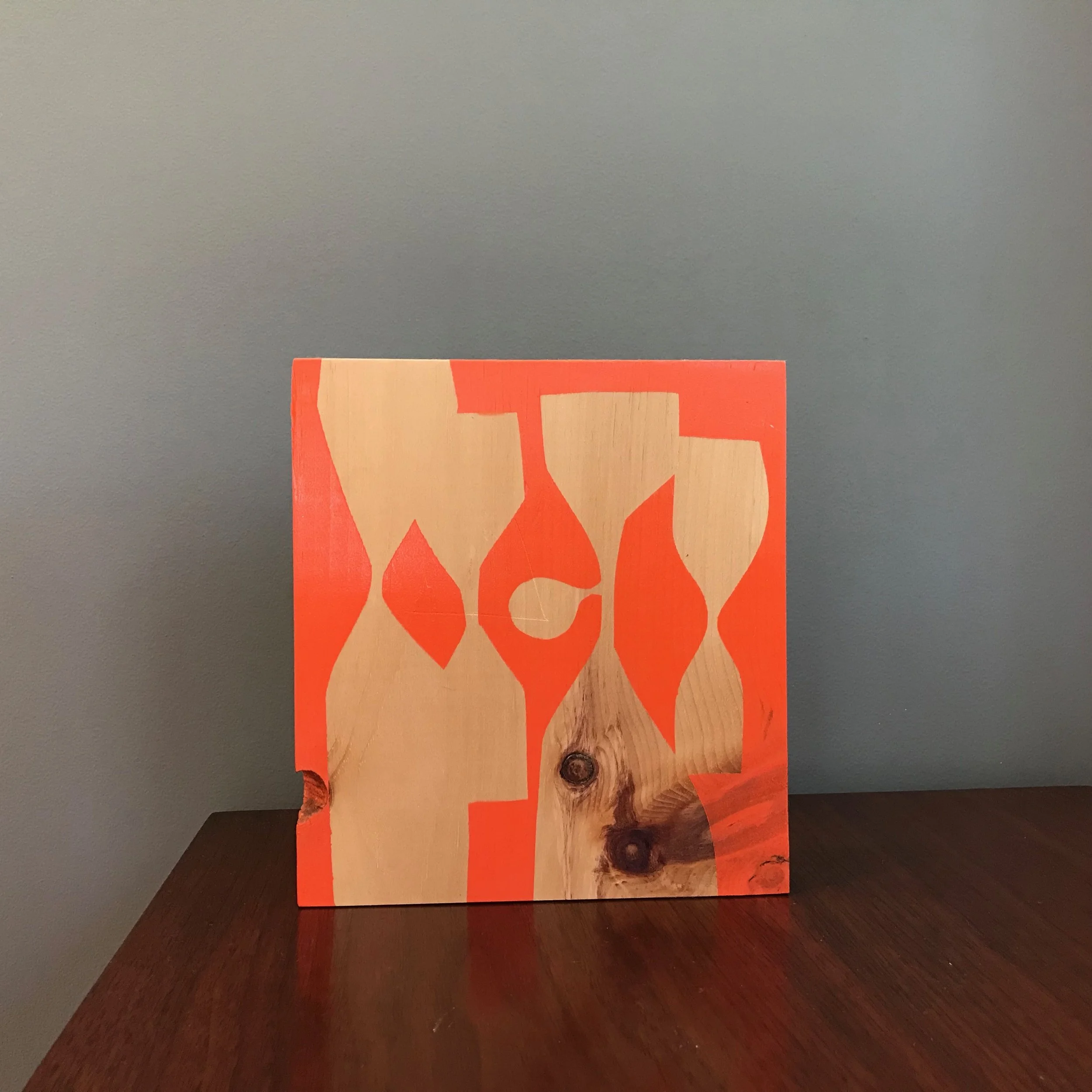 small neon orange painting