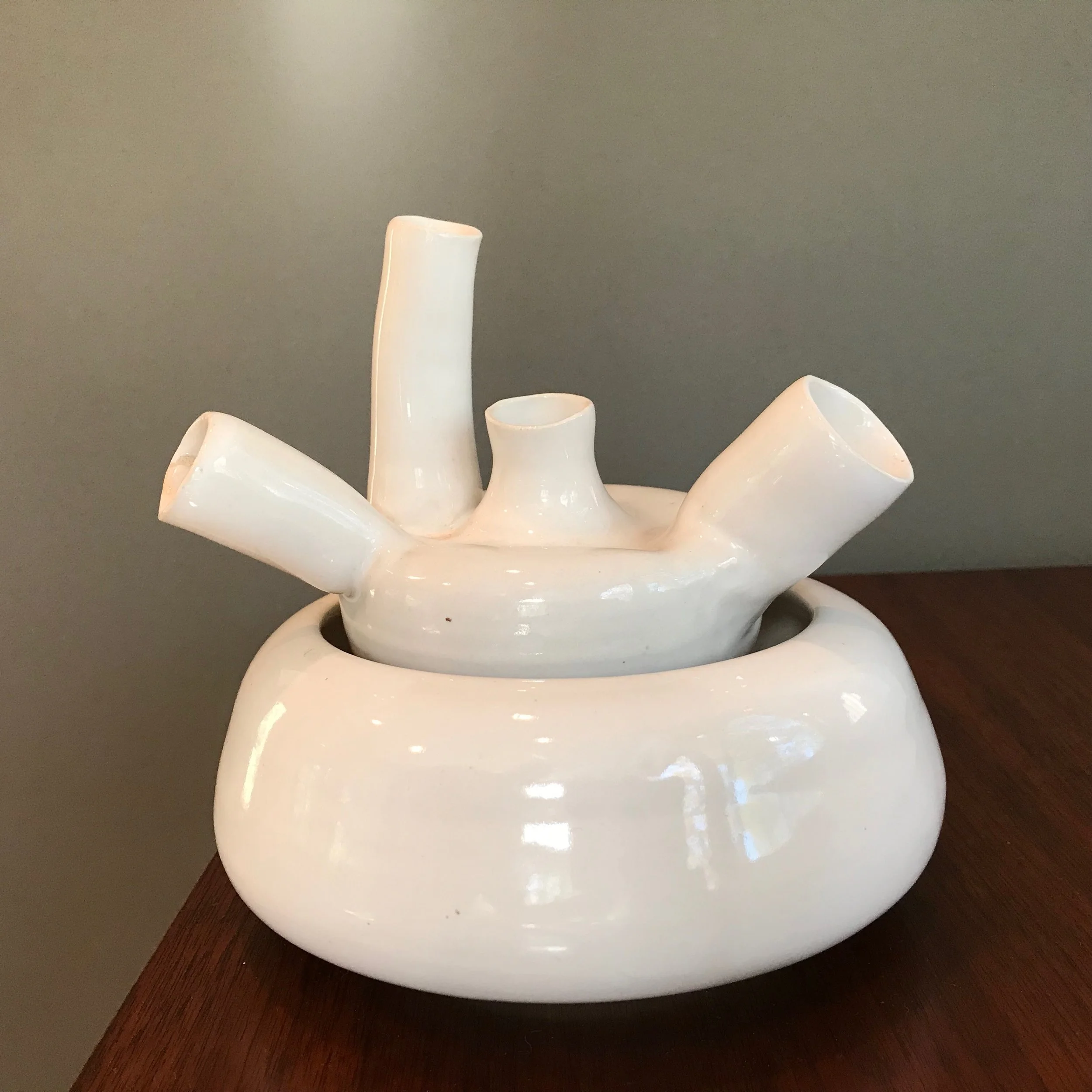 bell shaped bowl with nesting tubular vase