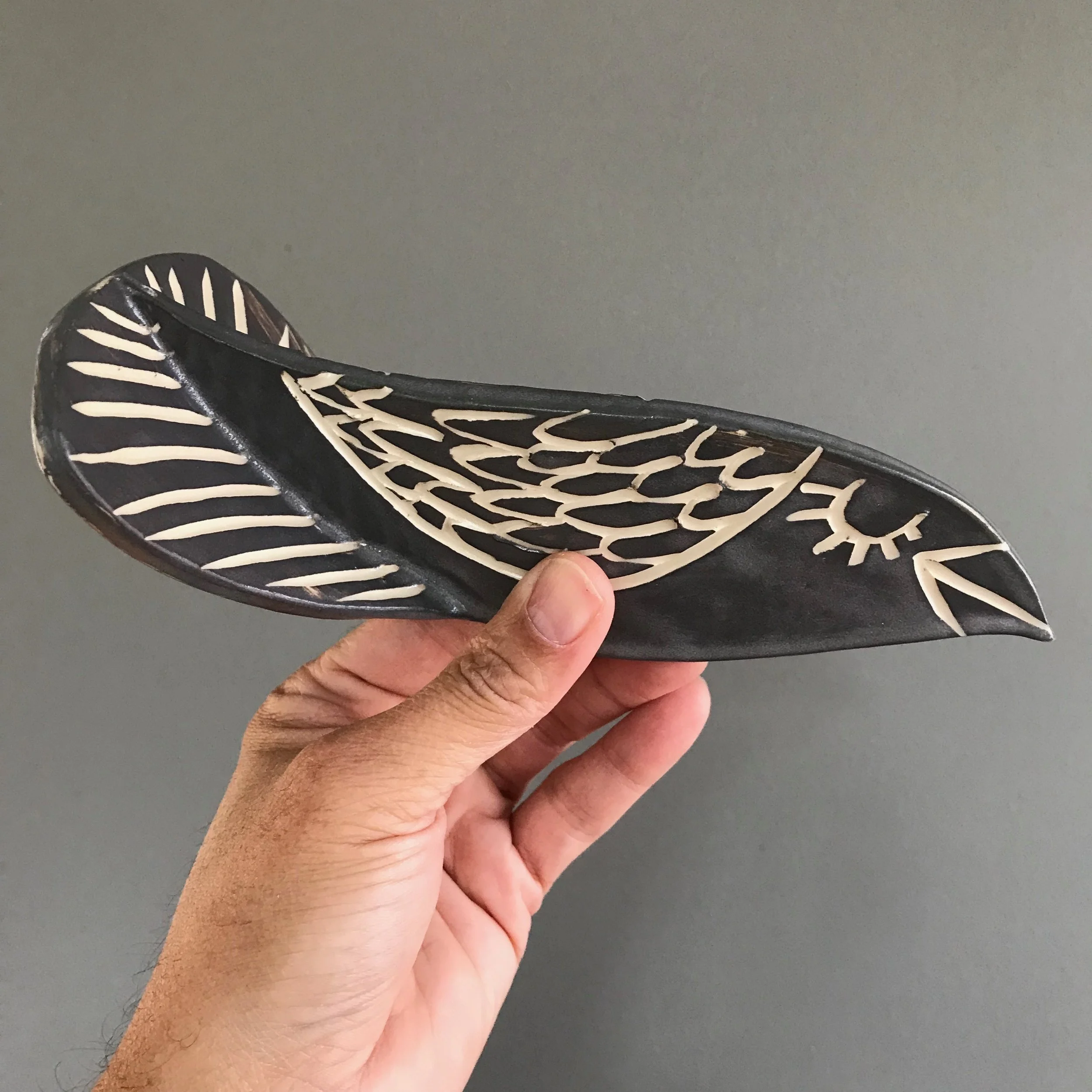 gray bird sculpture 3