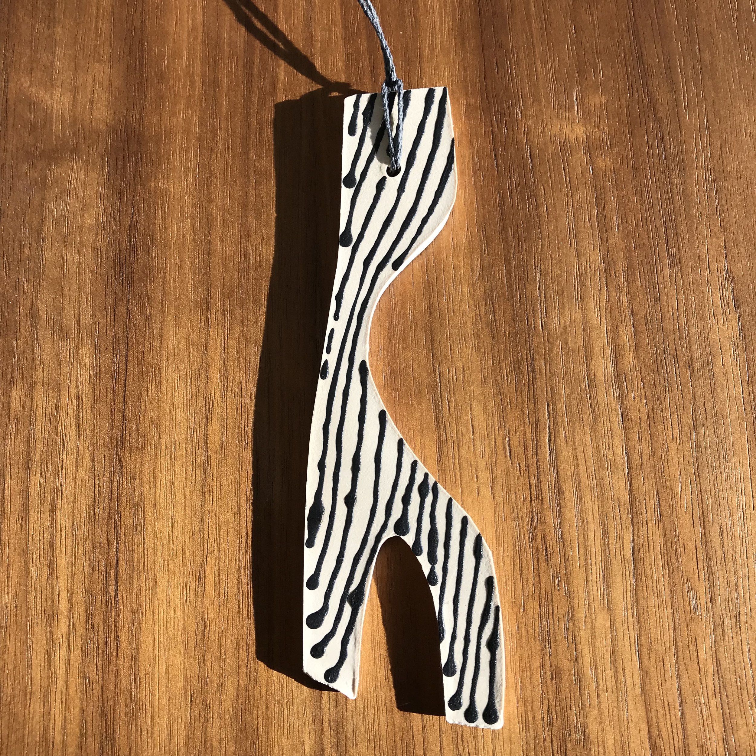 6" black and white ornament