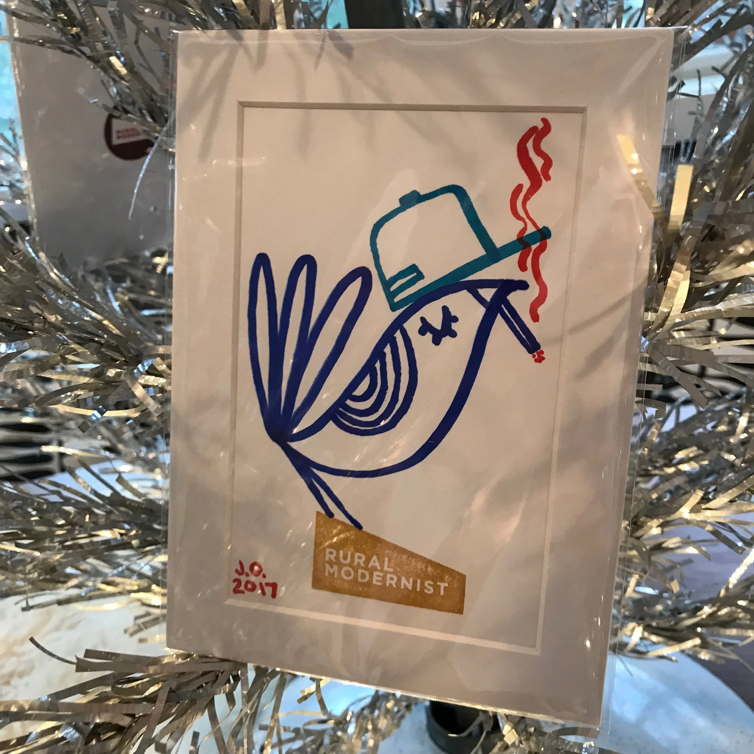 blue bird with cigarette and blue snapback hat