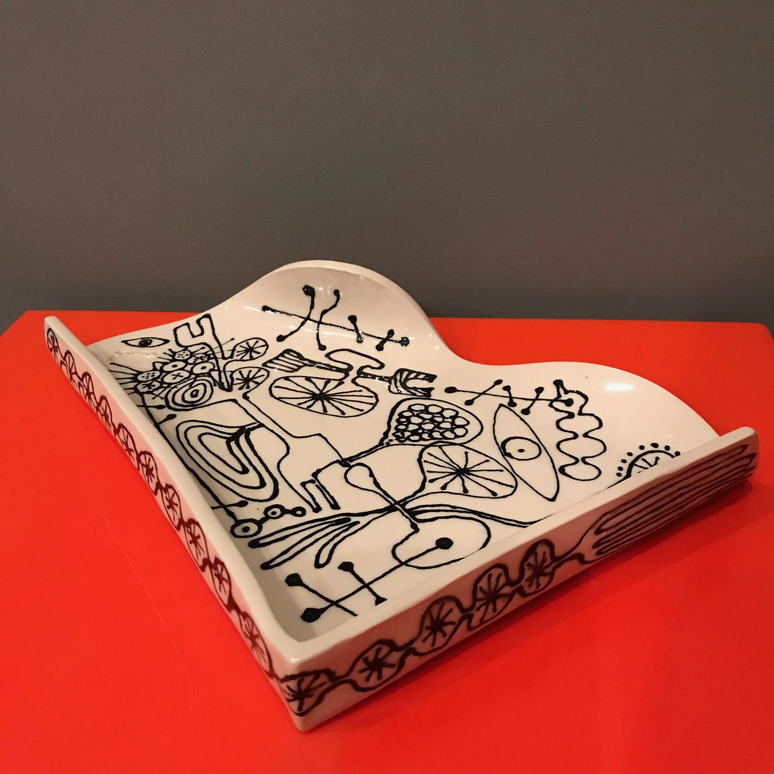 12" asymmetrical platter with hieroglyphics 