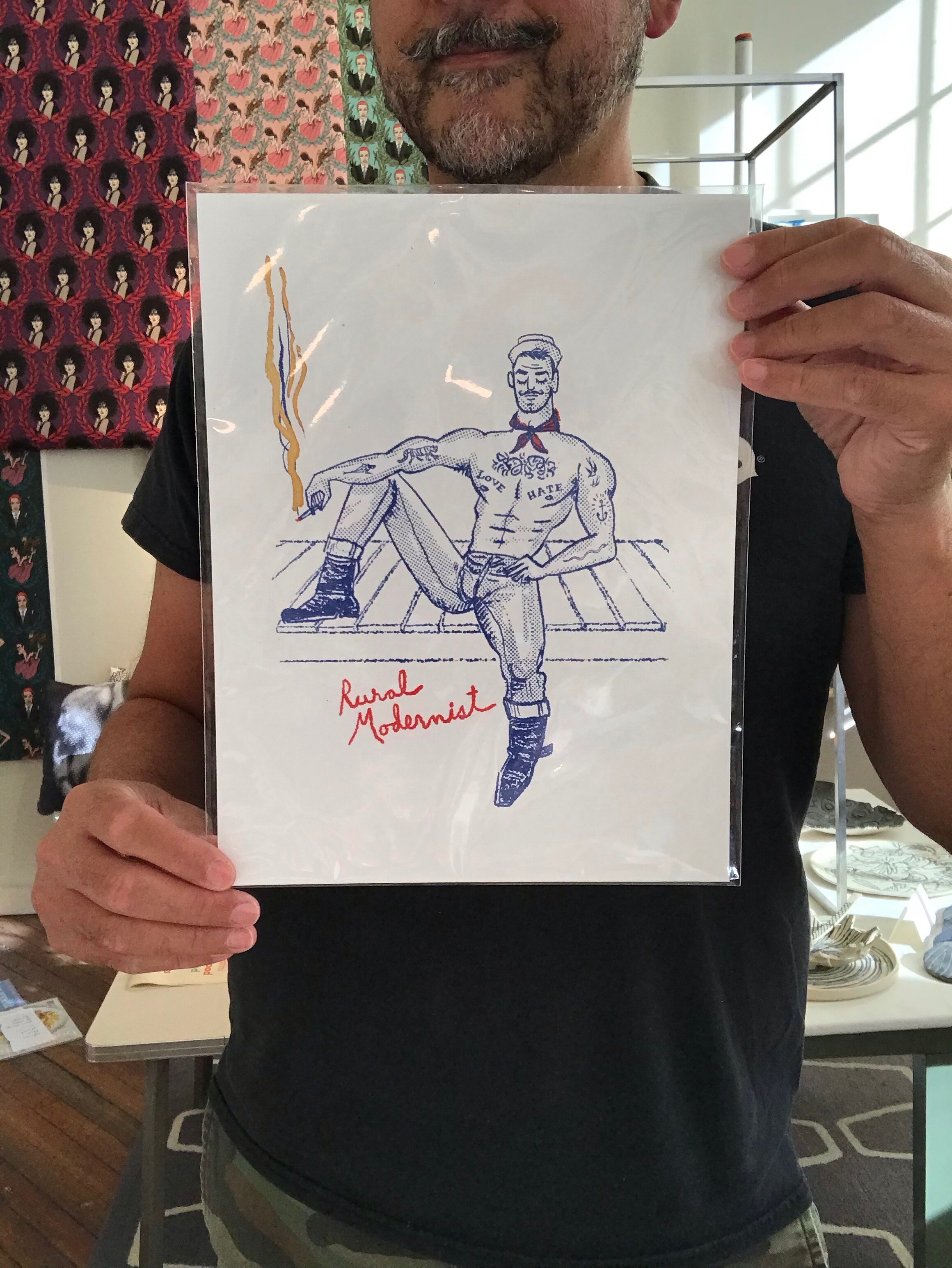 Shirtless sailor with gold leafed cigarette smoke