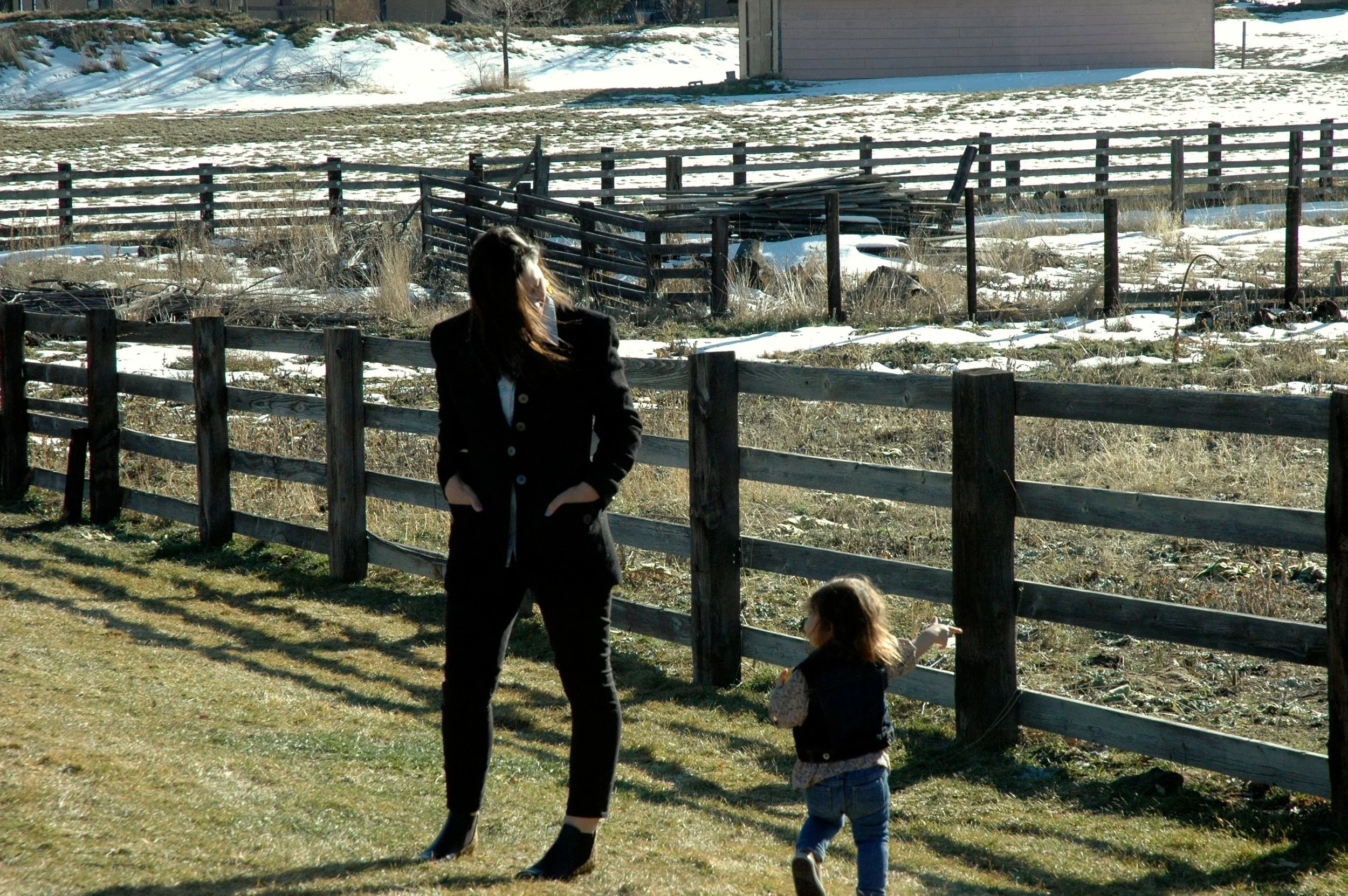 fence-hands-in-pockets.jpg