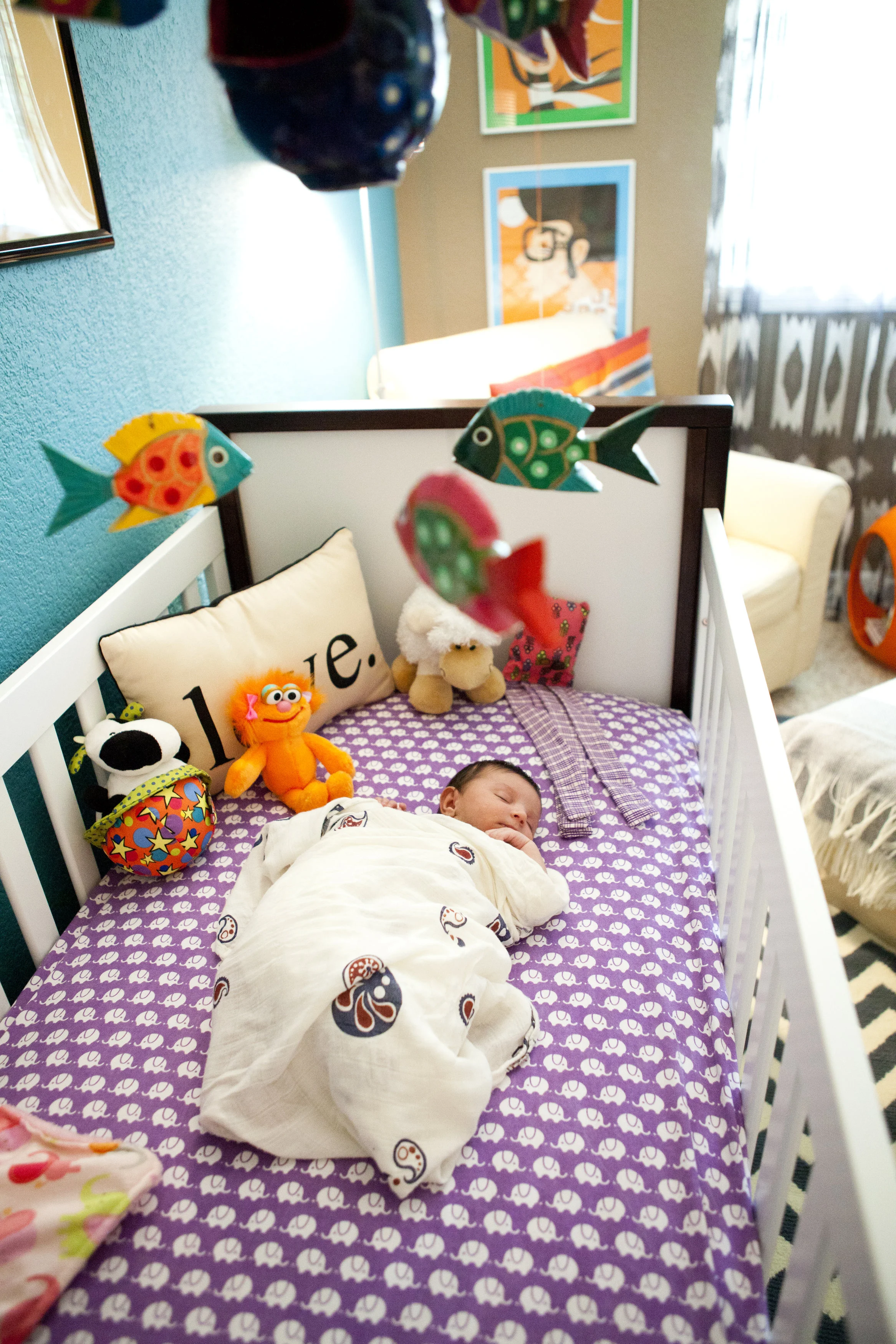 nursery-remy-in-crib-asleep-far.jpg