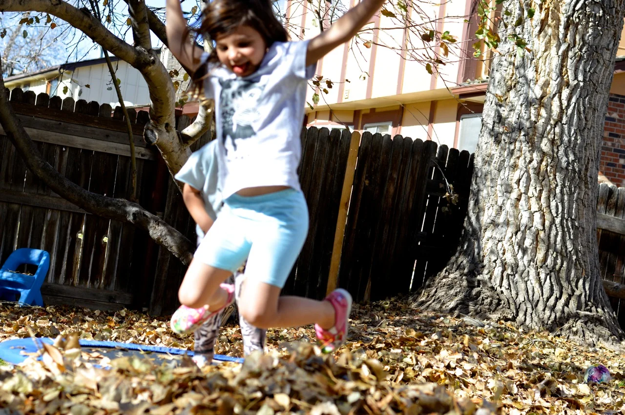 Jumping in Leaves and Mom Judging