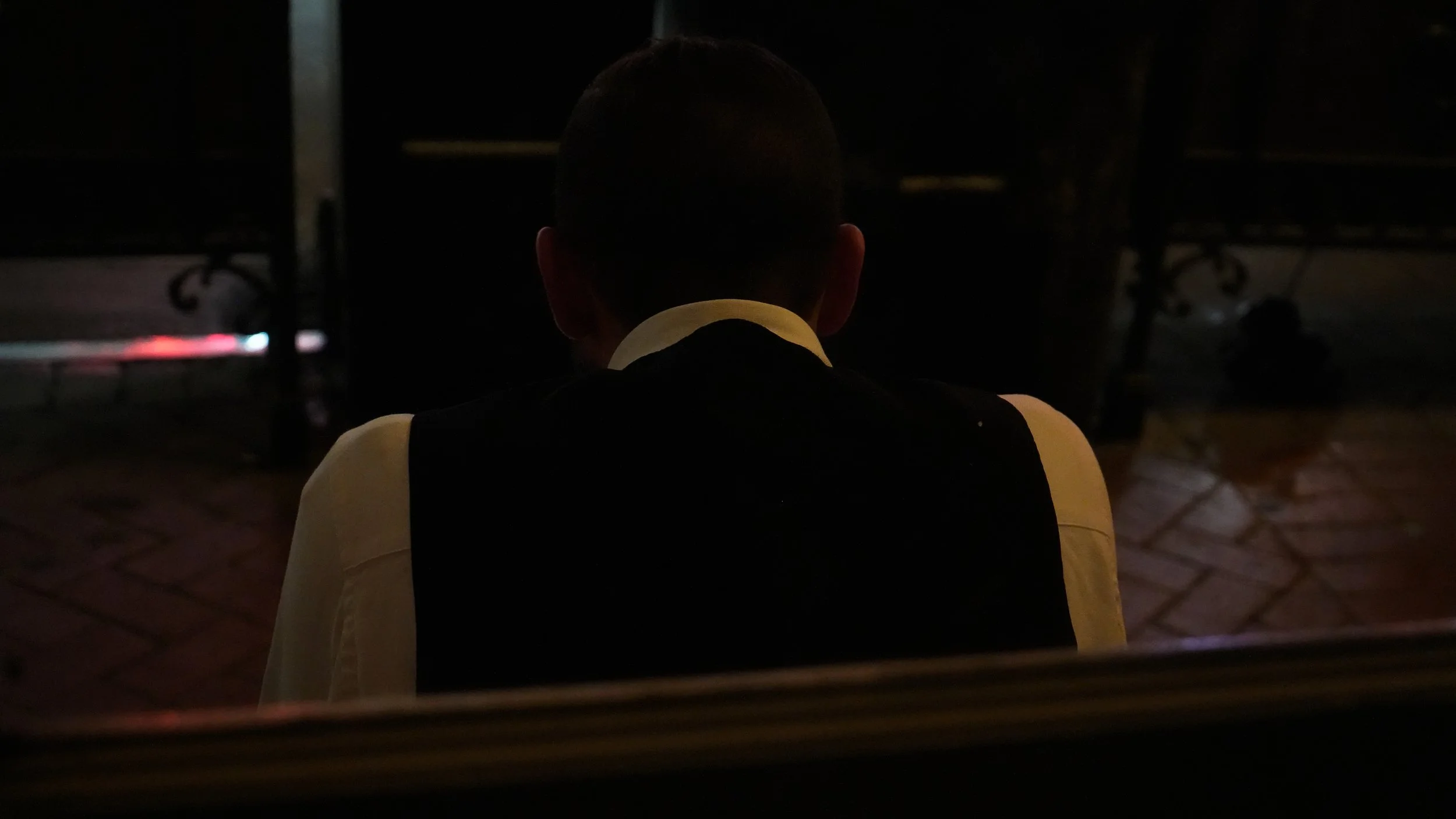 Waiter takes a break. New Orleans.