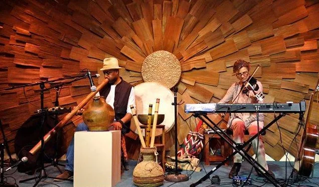 DUO VIDA featuring the earth rhythms of Abasi Ote and Teresa Aruzza on the main stage.