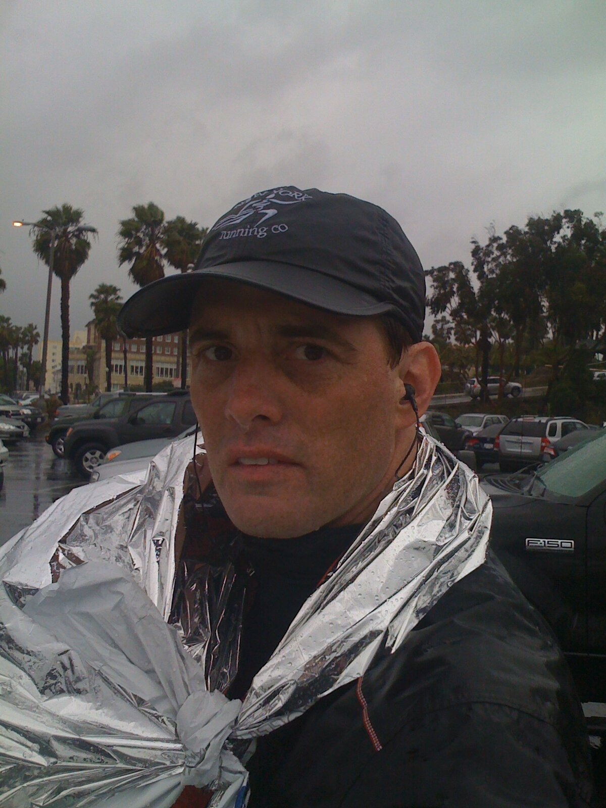  Frowning at the winds and rain post race. Someone poked me in the eye with an umbrella on my way to the car. Not the greatest “congratulations” after running 26.2 miles. 