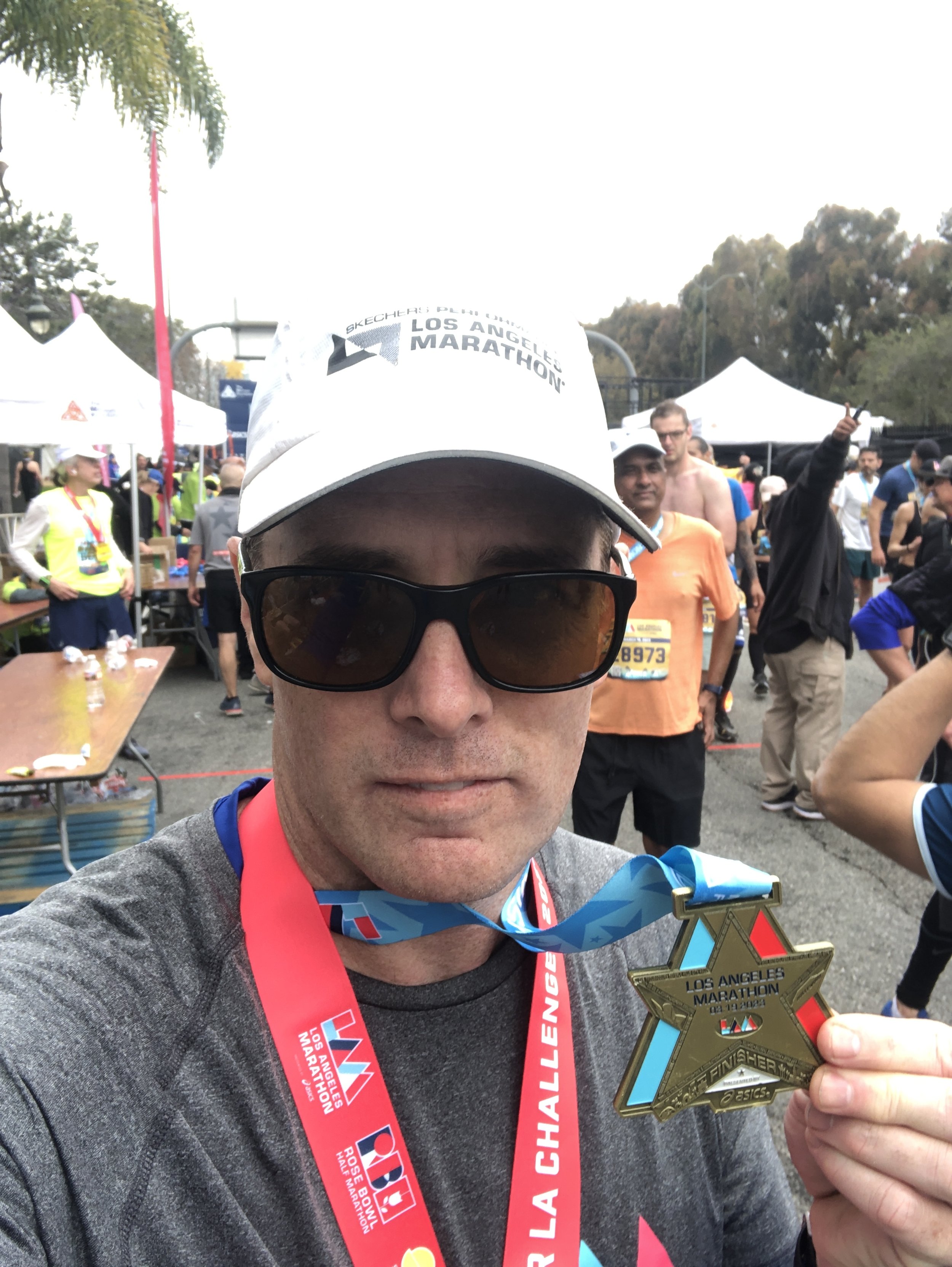 2 Medals! One for finishing the LA Marathon and another because I completed a series of 3 races called Conquer LA.