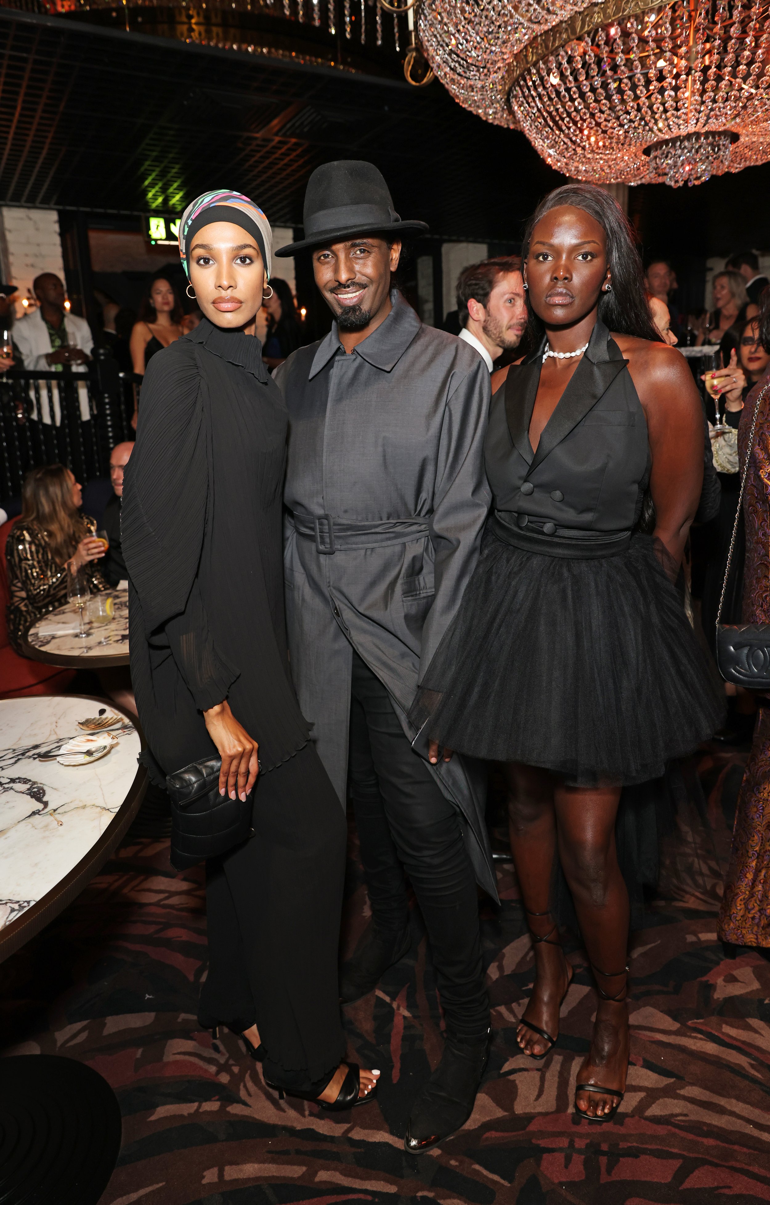 Ikram Abdi Omar,Mason Smillie and Ariish Wol at The MAINE Mayfair Launch Party38.jpg