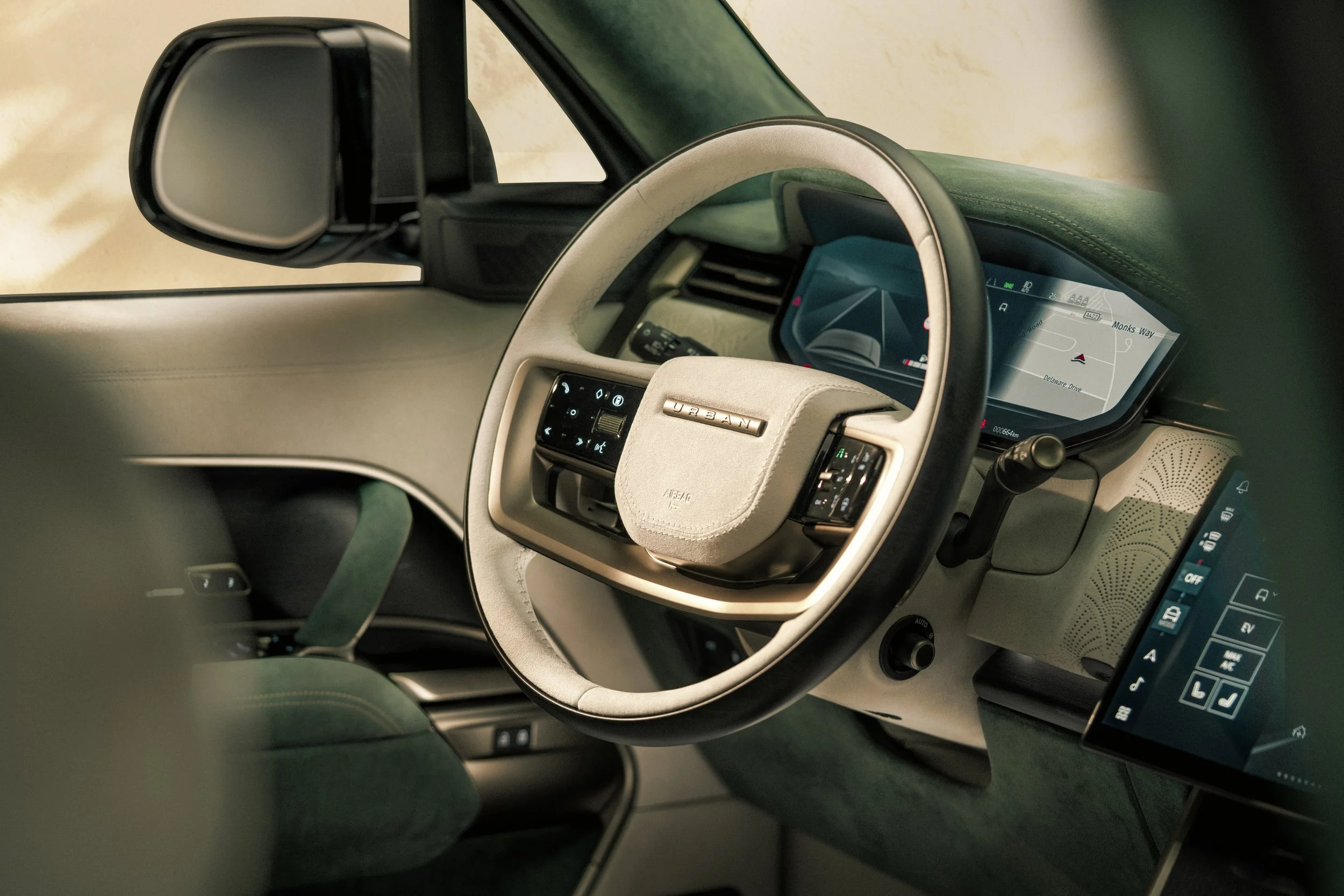 Urban Automotive x Visionnaire Range Rover Widetrack Interior Steering Wheel Detail.jpg