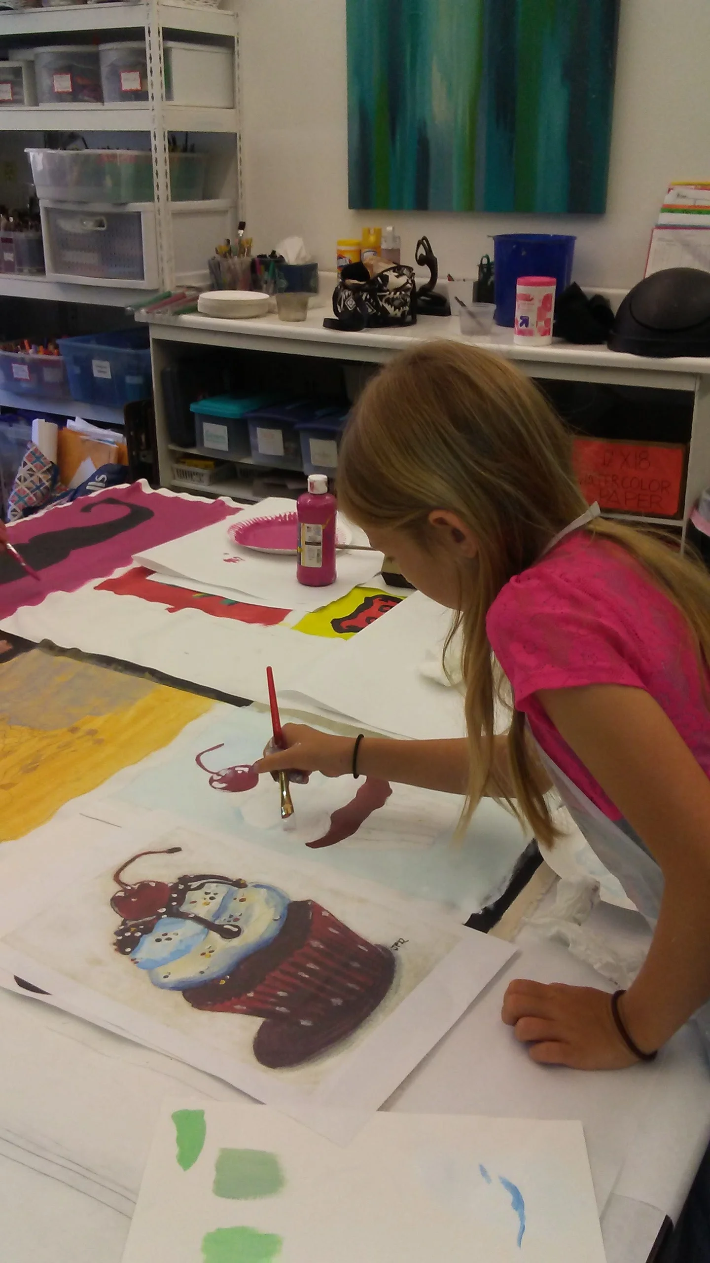 Students working on mural with acrylic paint (first time). 