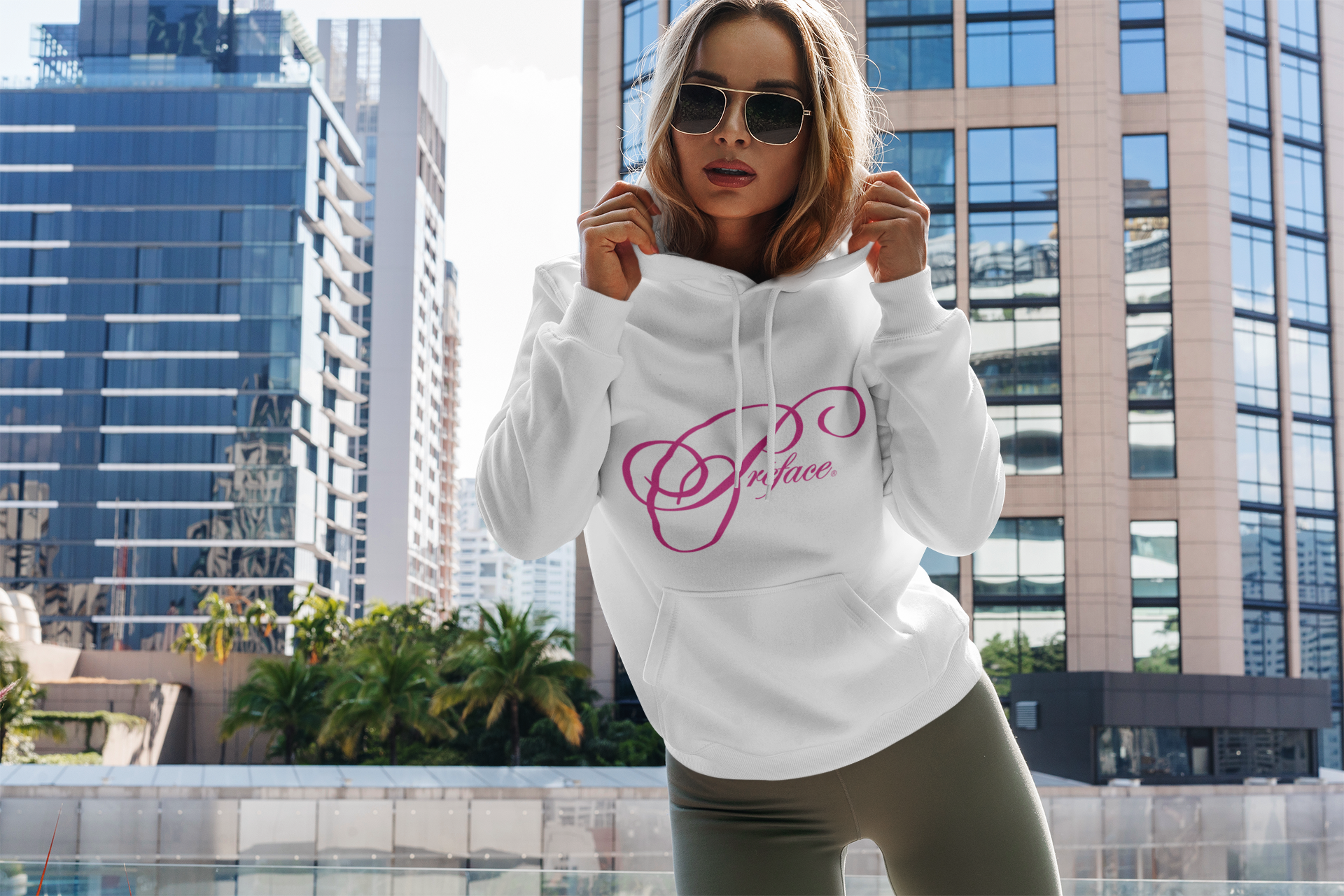 hoodie-mockup-featuring-a-woman-posing-and-some-buildings-in-the-background-3550-el1.png