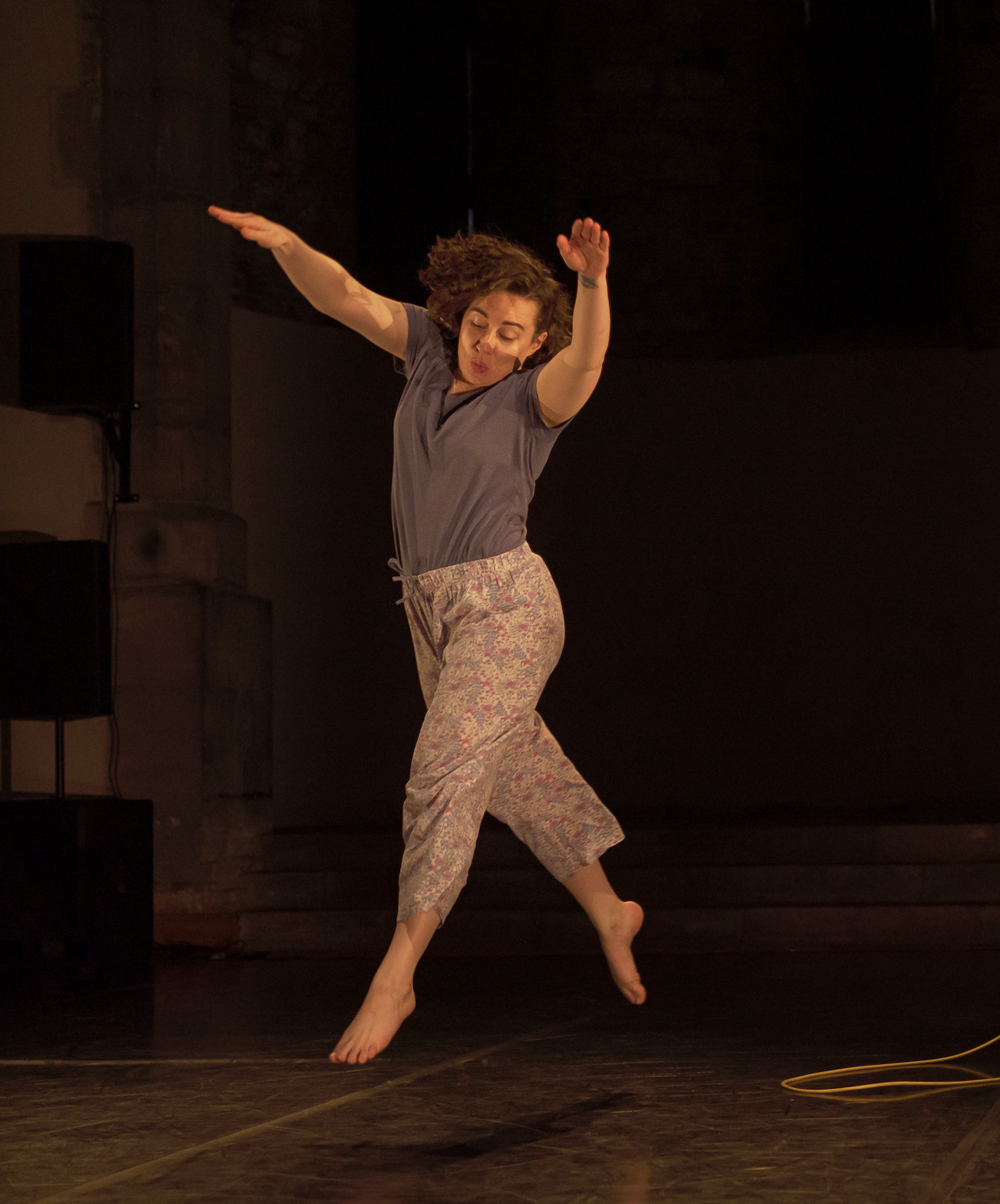 Galway Limerick dance artist teacher playfully leaping on stage