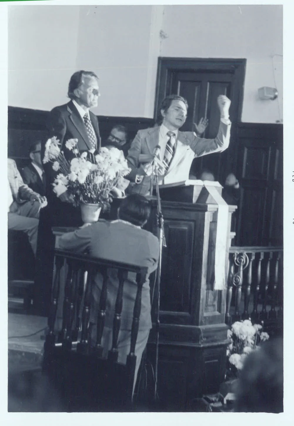 Luis interpreting for Billy Graham at a pastors’ gathering in Guatemala, 1976.