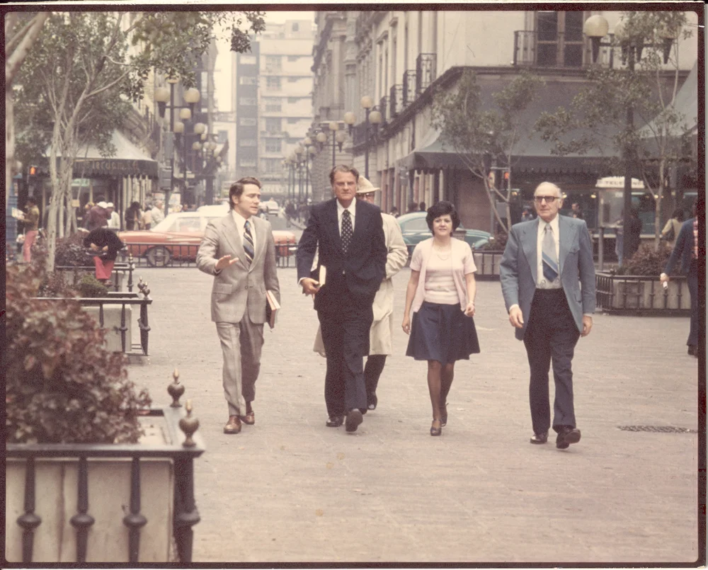 Luis and Billy Graham walking the streets of Mexico City, 1972.