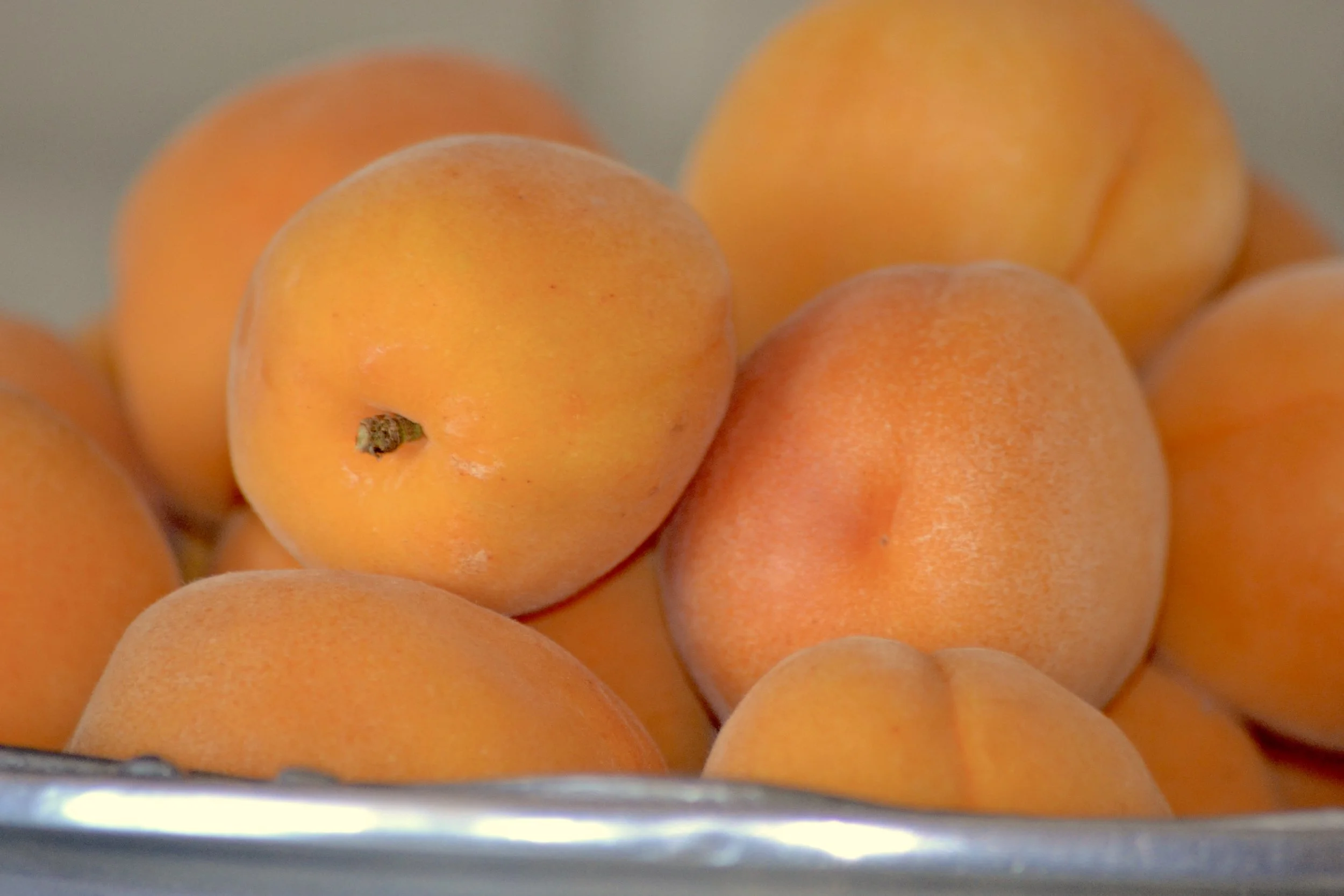 Apricots have a thin skin which makes for easy work. No peeling off pesky skin! Just rinse, slice, and eat.