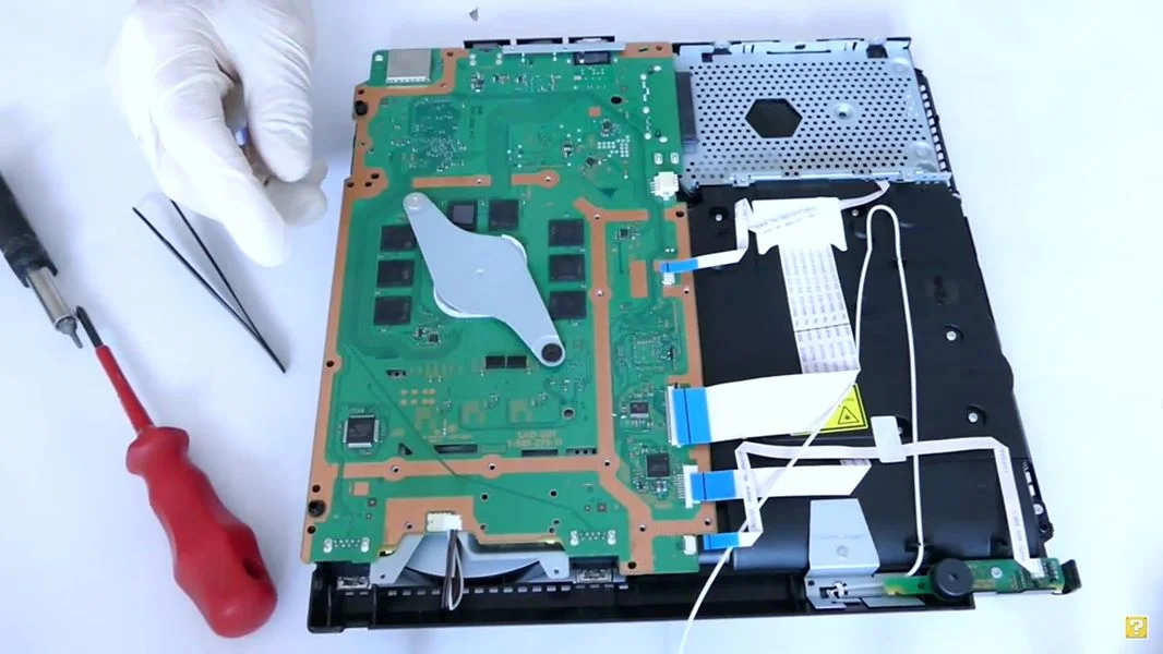 Watch a PS4 Slim Get Stripped Down