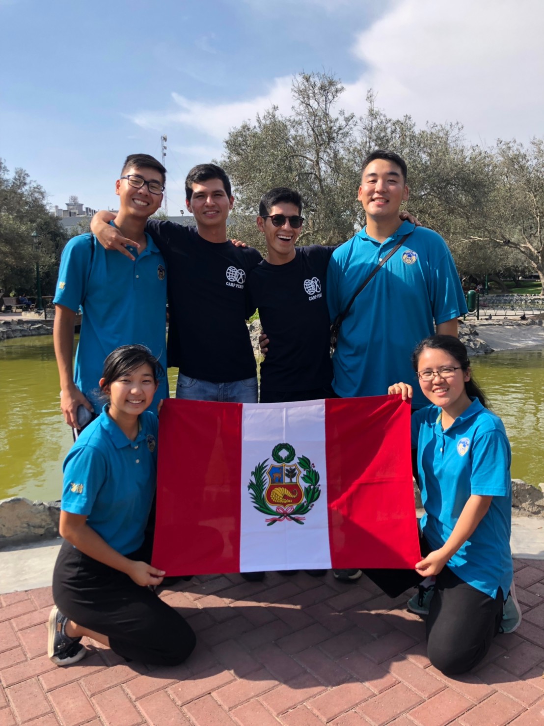 3.17 - Peru flag, group photo.png