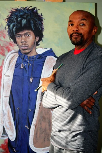 Rick Lewis with one of of his most recent portraits.