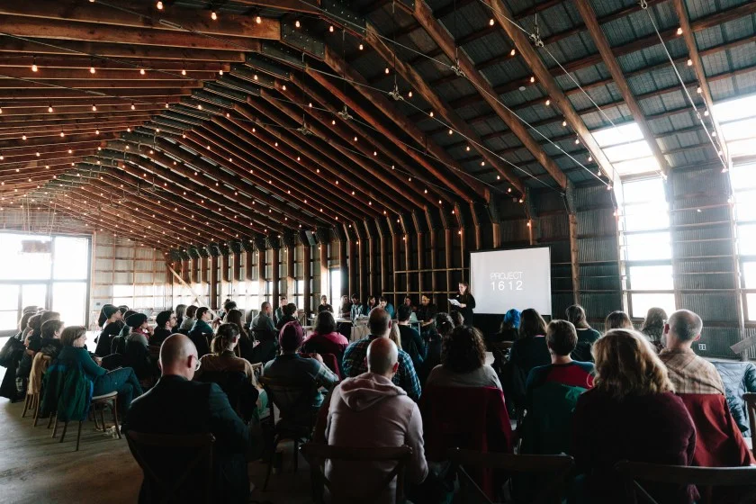 Beyond Alternatives participants listening to opening remarks by Dulcee Boehm at Bluestem Hall. Photo by Justine Bursoni.