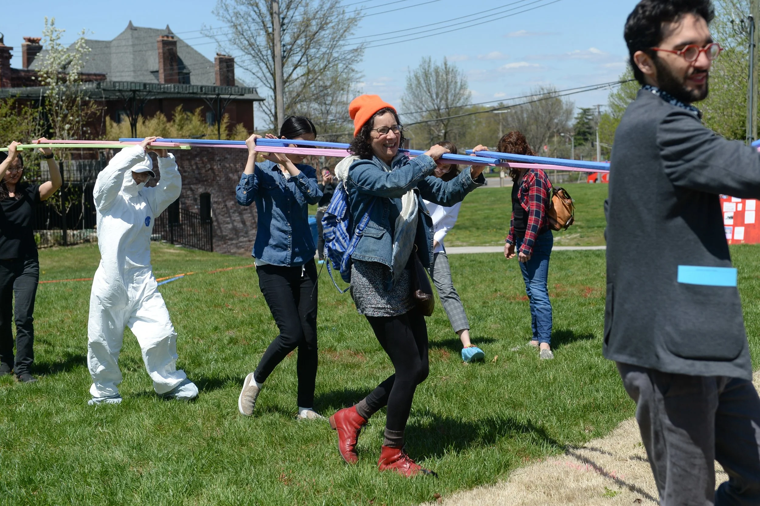 Participants in Eric Ellingsen and Species of Space, “the earth is blue like an orange (landscape performances welcoming the future now Chouteau Greenway),” 2018, presented as a part of Dwell In Other Futures: Art / Urbanism / Midwest. Pulitzer Arts Foundation, St. Louis. April 28, 2018. Photo by Michael Thomas.