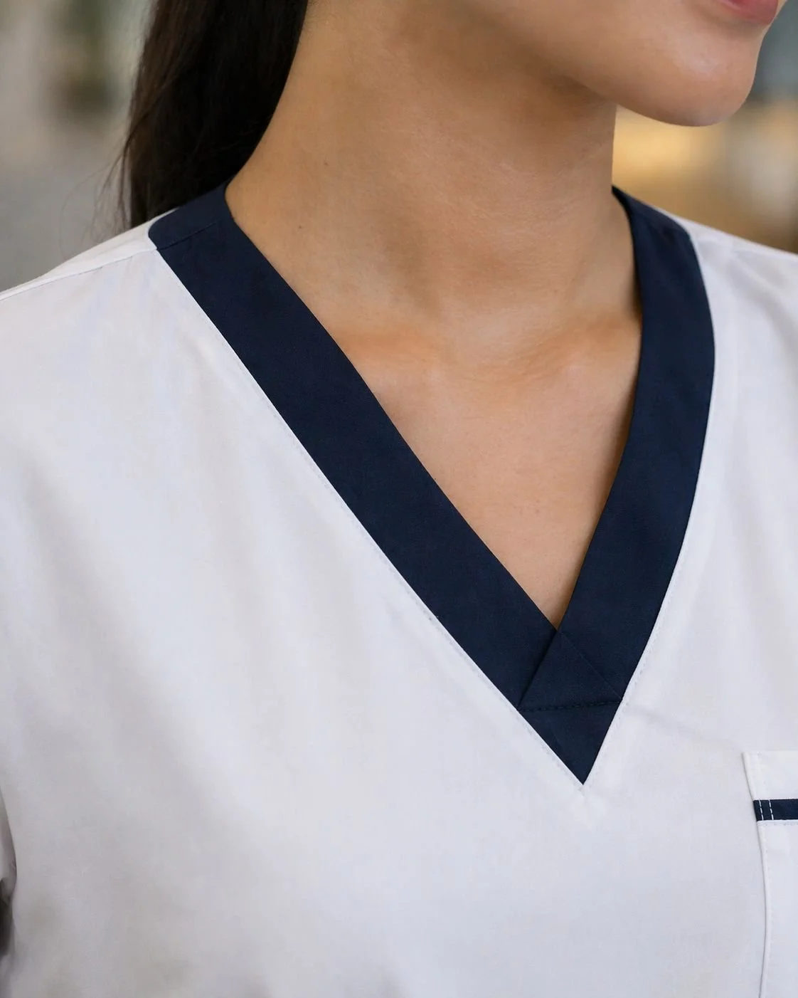 Nurse scrub suit for healthcare staff in hospitals and clinics. Contrast collar. Made in Dubai UAE for clinics.