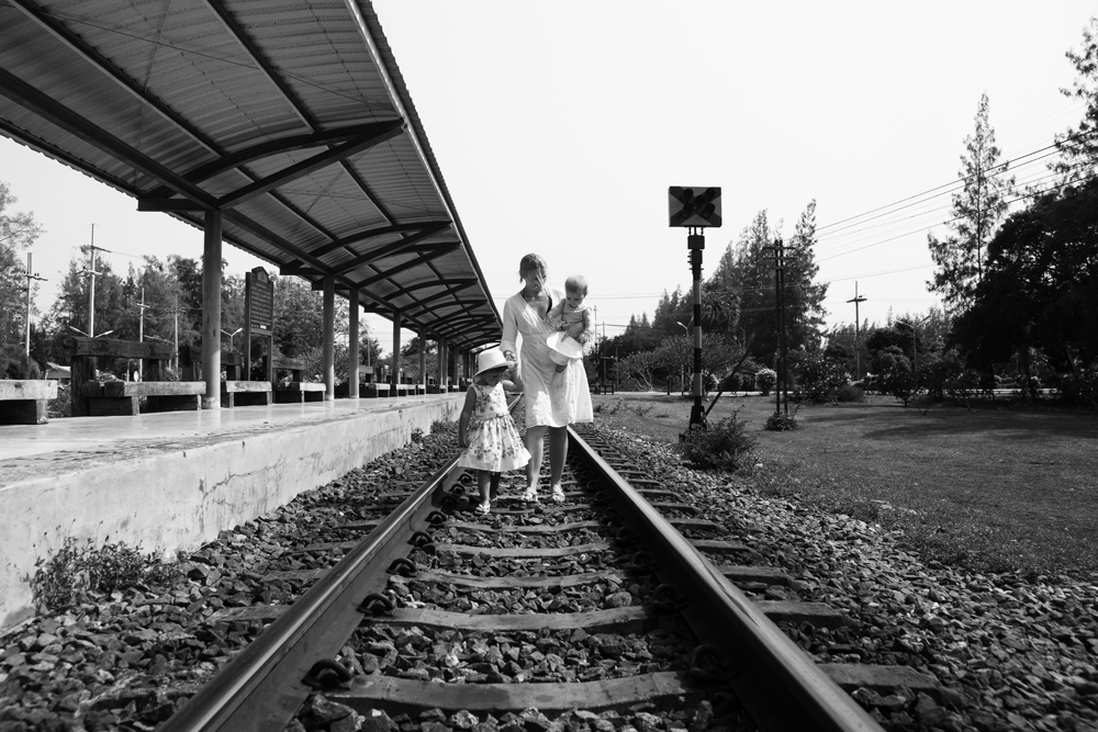 family-walking-on-train-track-1.jpg