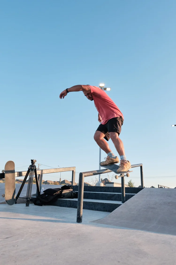 Jared riding a rail at golden hour
