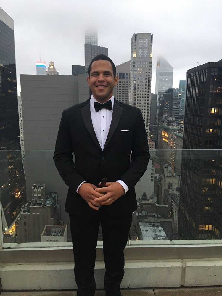 Jared Stevenson, dressed up and smiling